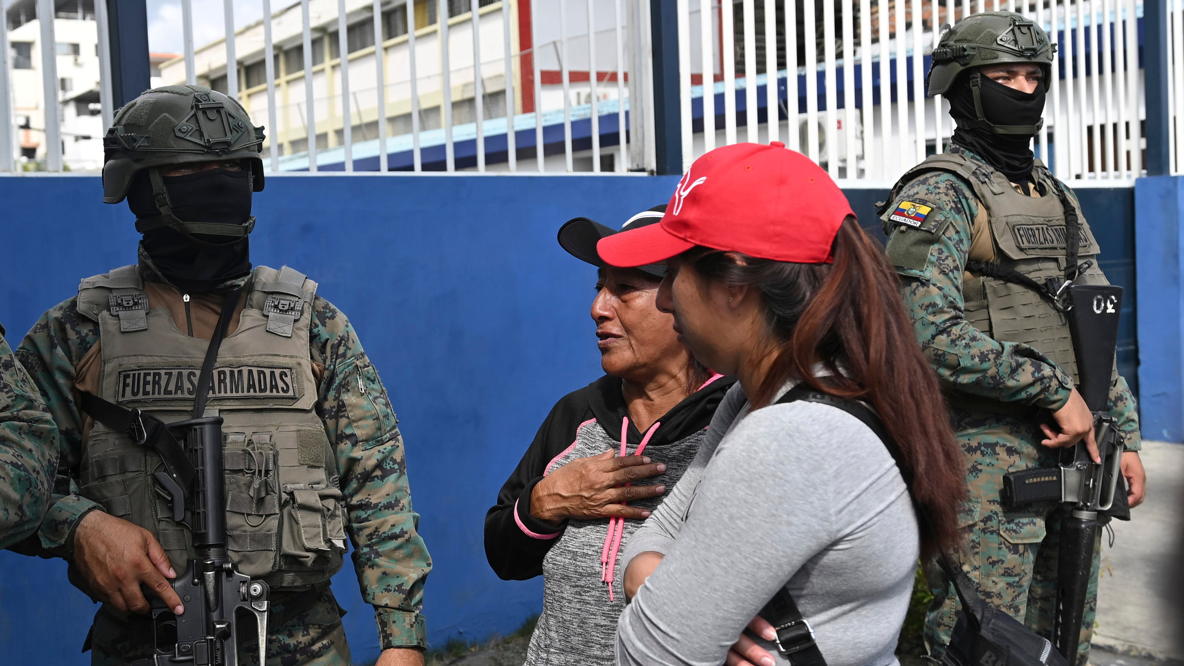 Women seek information about the expected arrival of their relatives who were aboard the Maria Candelaria, a vessel intercepted two days prior by U.S. authorities on suspicion of alleged drug trafficking, at the port in Manta, Ecuador, Monday, Sept. 7, 2026. (AP Photo/Ariel Ochoa)