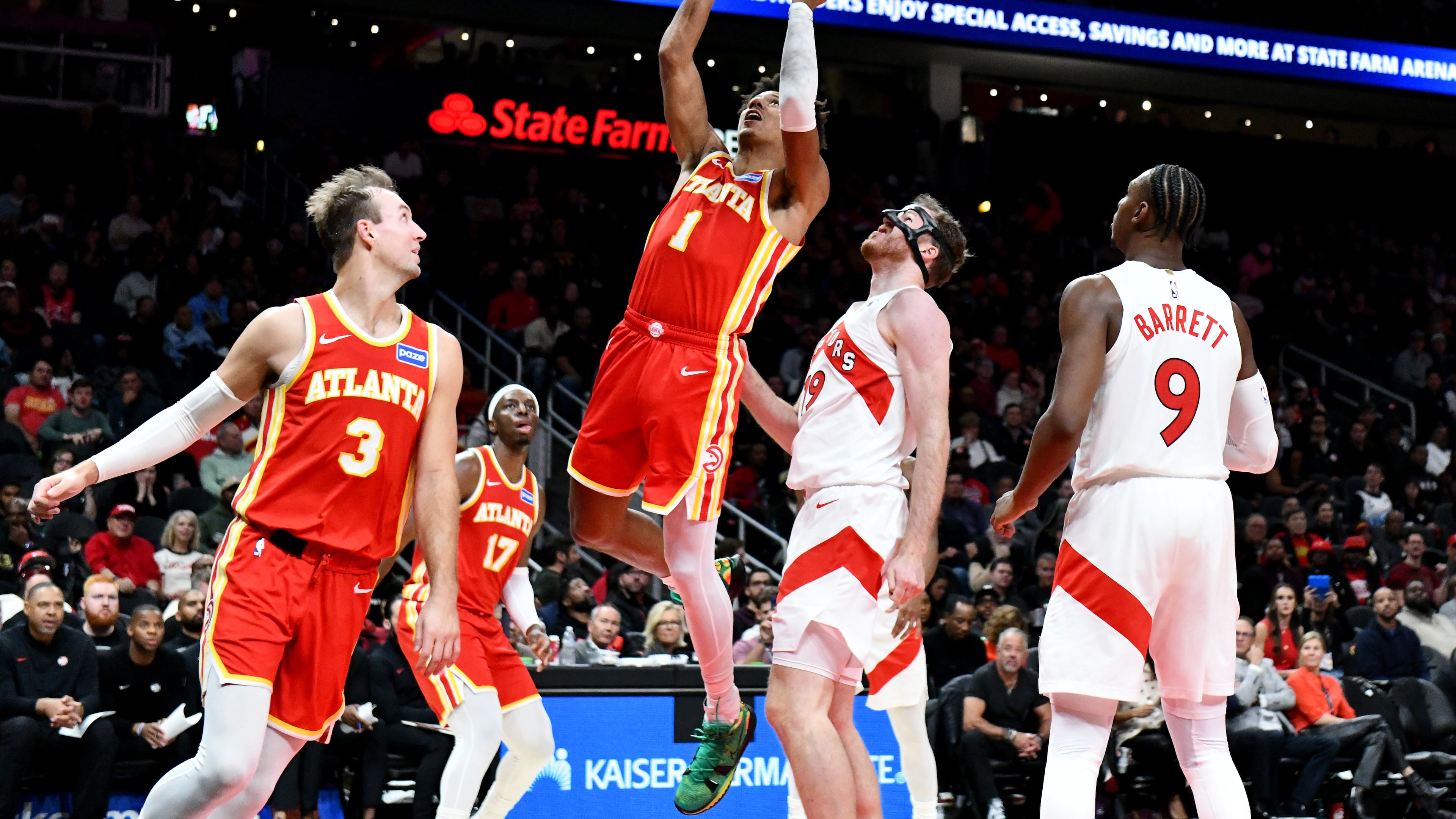 Atlanta Hawks forward Jalen Johnson (1) goes to the basket for the shot during the second half in the home opener at State Farm Arena, Thursday, October 22, 2025, in Atlanta. The Toronto Raptors won 138-118 over the Hawks. (Hyosub Shin/AJC)