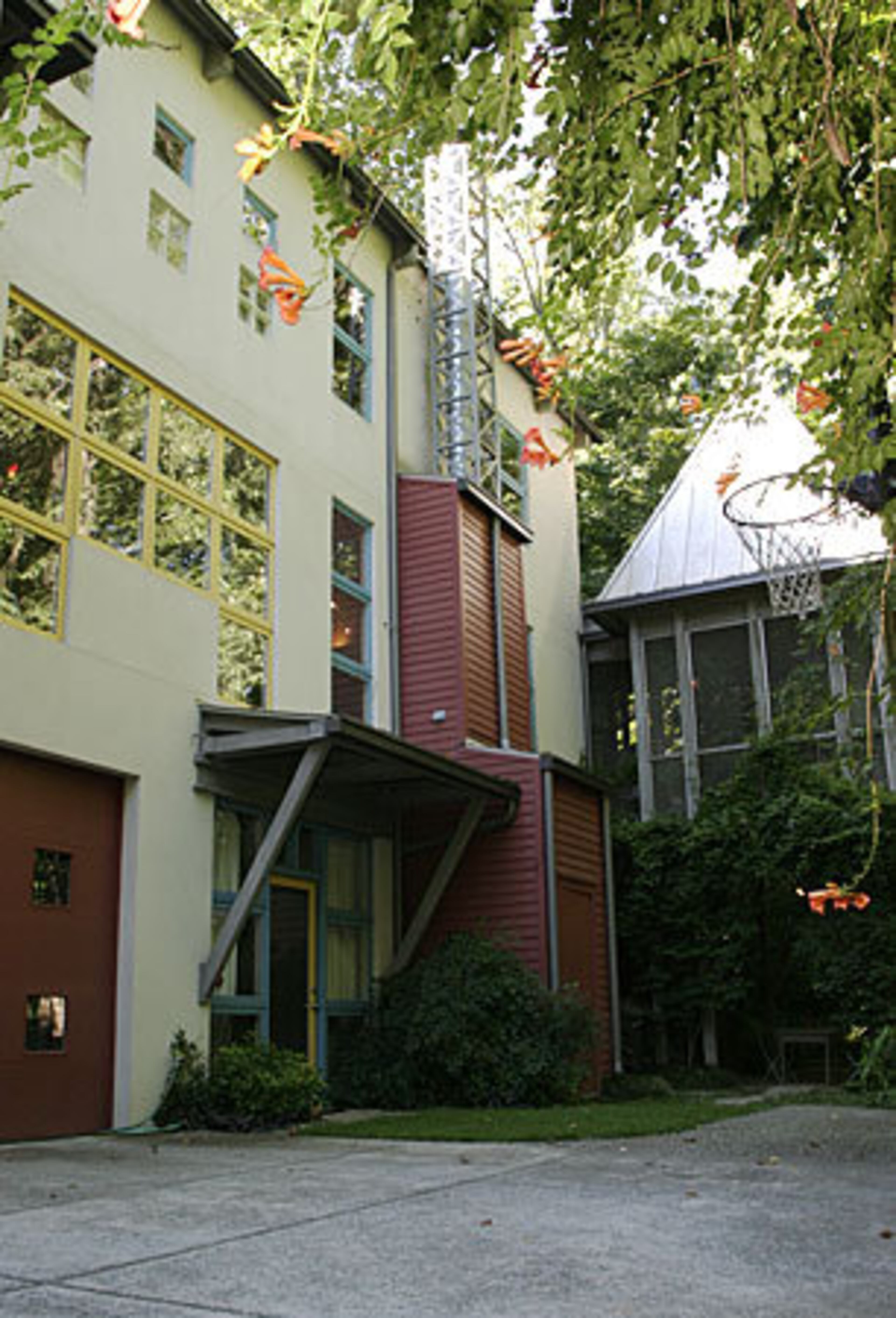 The Lewis-Johnson residence was one of Winer's first residential projects. He was more comfortable at that time using monochomatic colors, so Lewis chose the primary exterior trim colors.