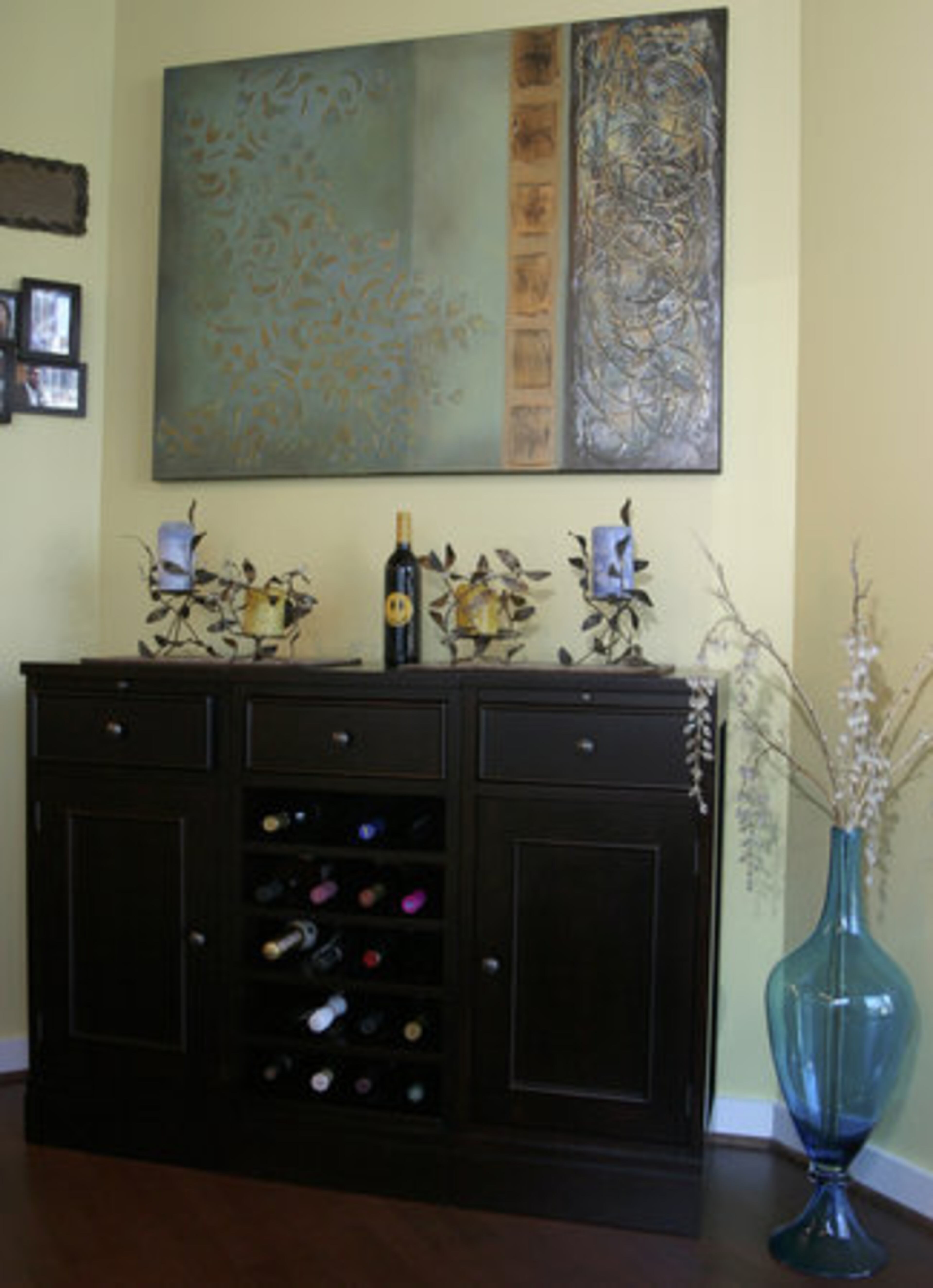 Miranda views her home as "contemporary, modern, sophistication, fun and cozy." "Each piece was chosen and agreed upon together, which for us makes it that much more special. We know it's OUR home, reflective of our mutual personalities," she says. "We chose all the colors together and think they look really well together," reflects Miranda. "The baby blue and the brown complement each other and the bright yellow actually complements our personality and Caribbean sunshine ... warm environments."