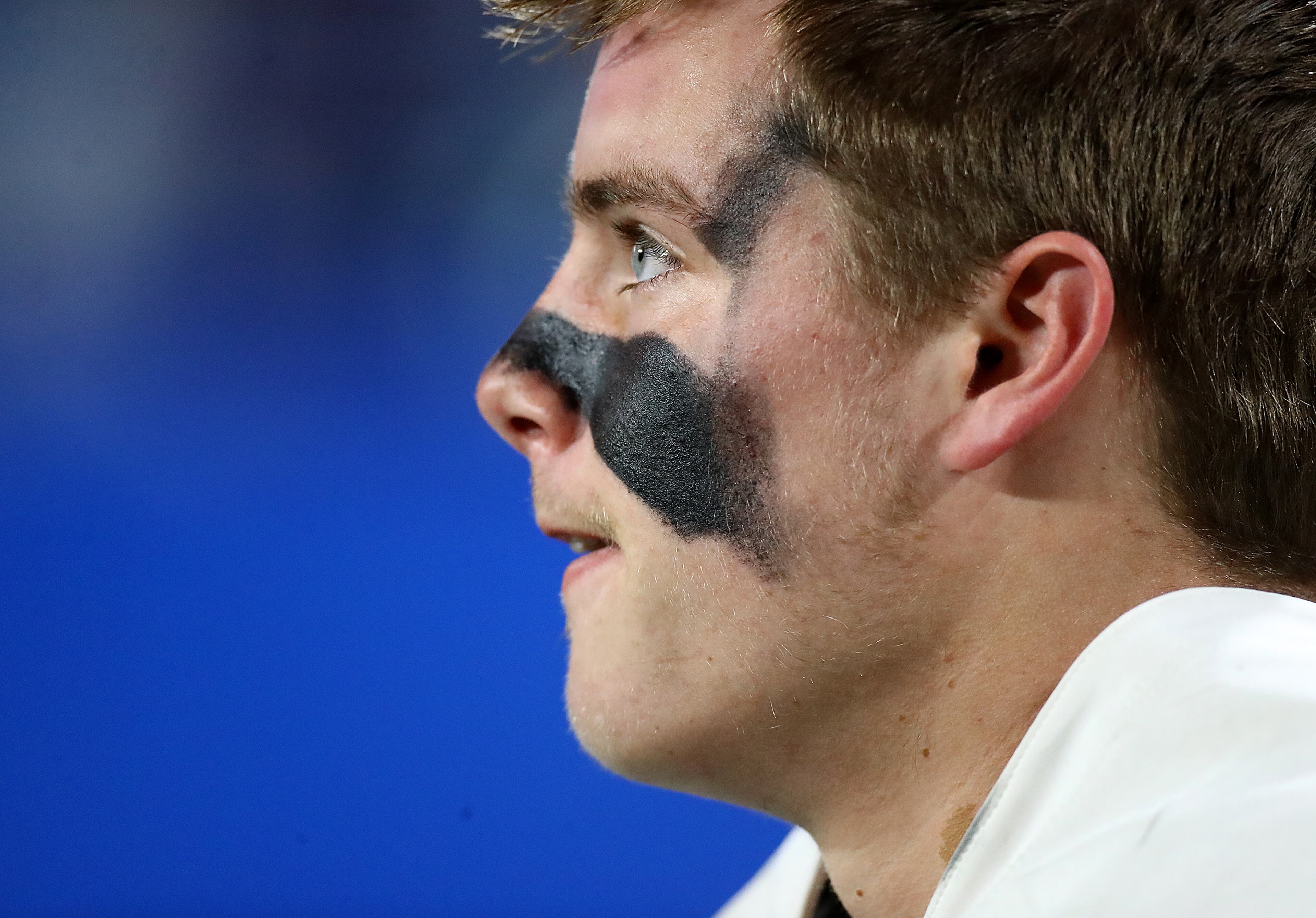 Trinity Christian quarterback David Dallas looks on from the sidelines between offensive series against Prince Avenue Christian in their GHSA Class A Private Championship game on Thursday, Dec 9, 2021, in Atlanta. “Curtis Compton / Curtis.Compton@ajc.com”`