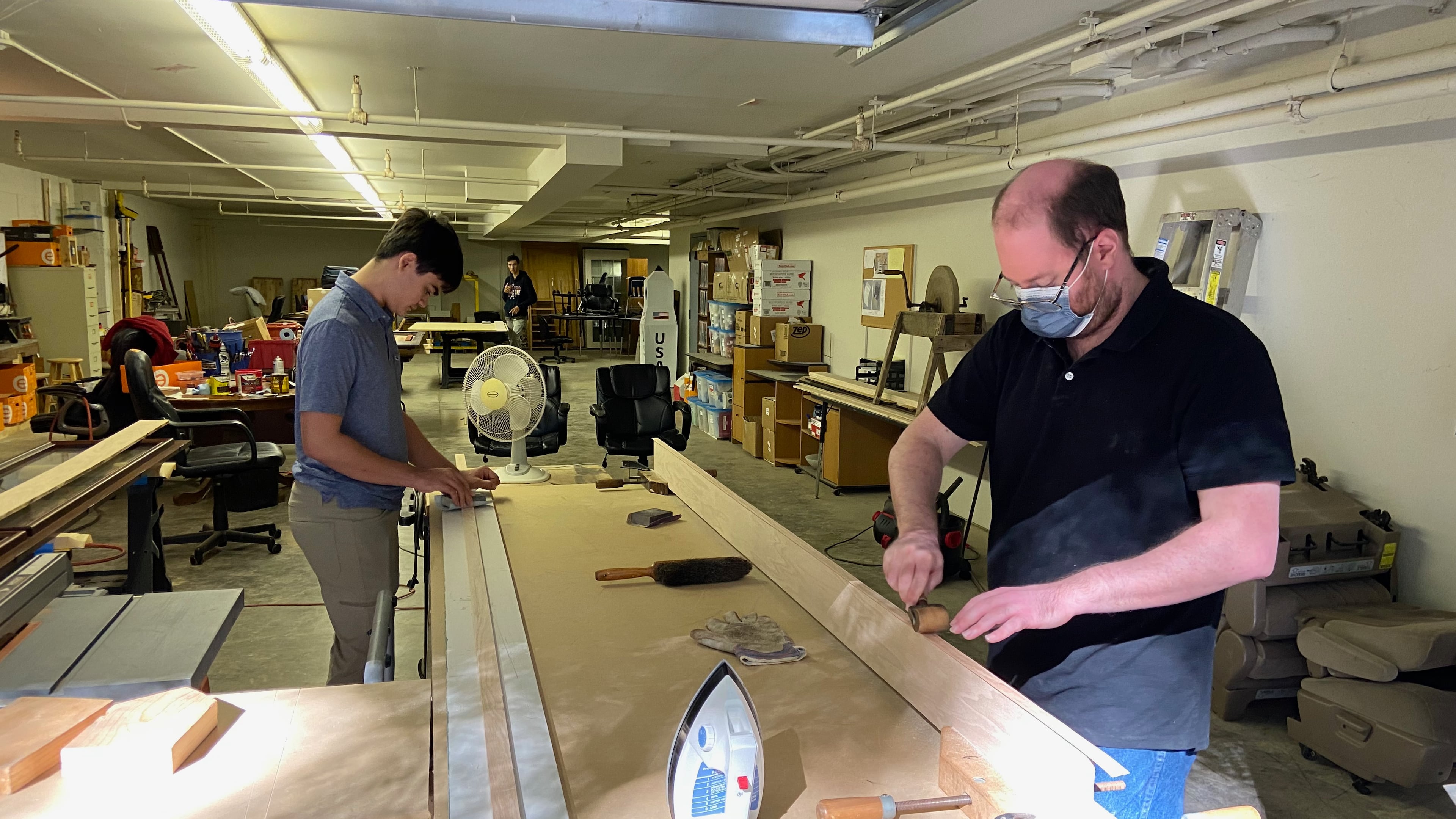 Students from Eaton Academy in Roswell worked for weeks to refurbish display cases at the nearby Computer Museum of America.