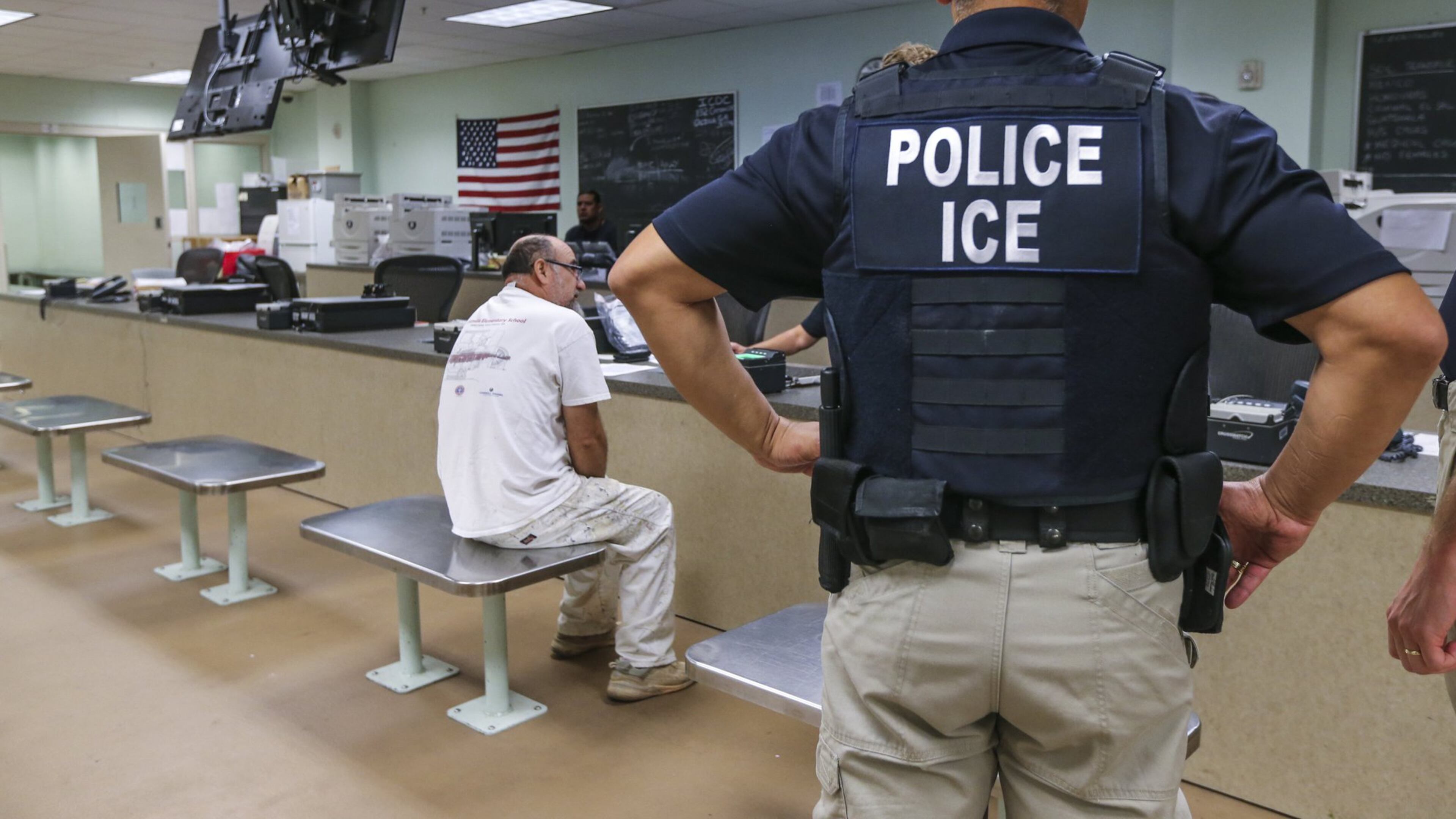 U.S. Immigration and Customs Enforcement officers detaining a Mexican national in Atlanta, Aug. 18, 2017. JOHN SPINK/JSPINK@AJC.COM