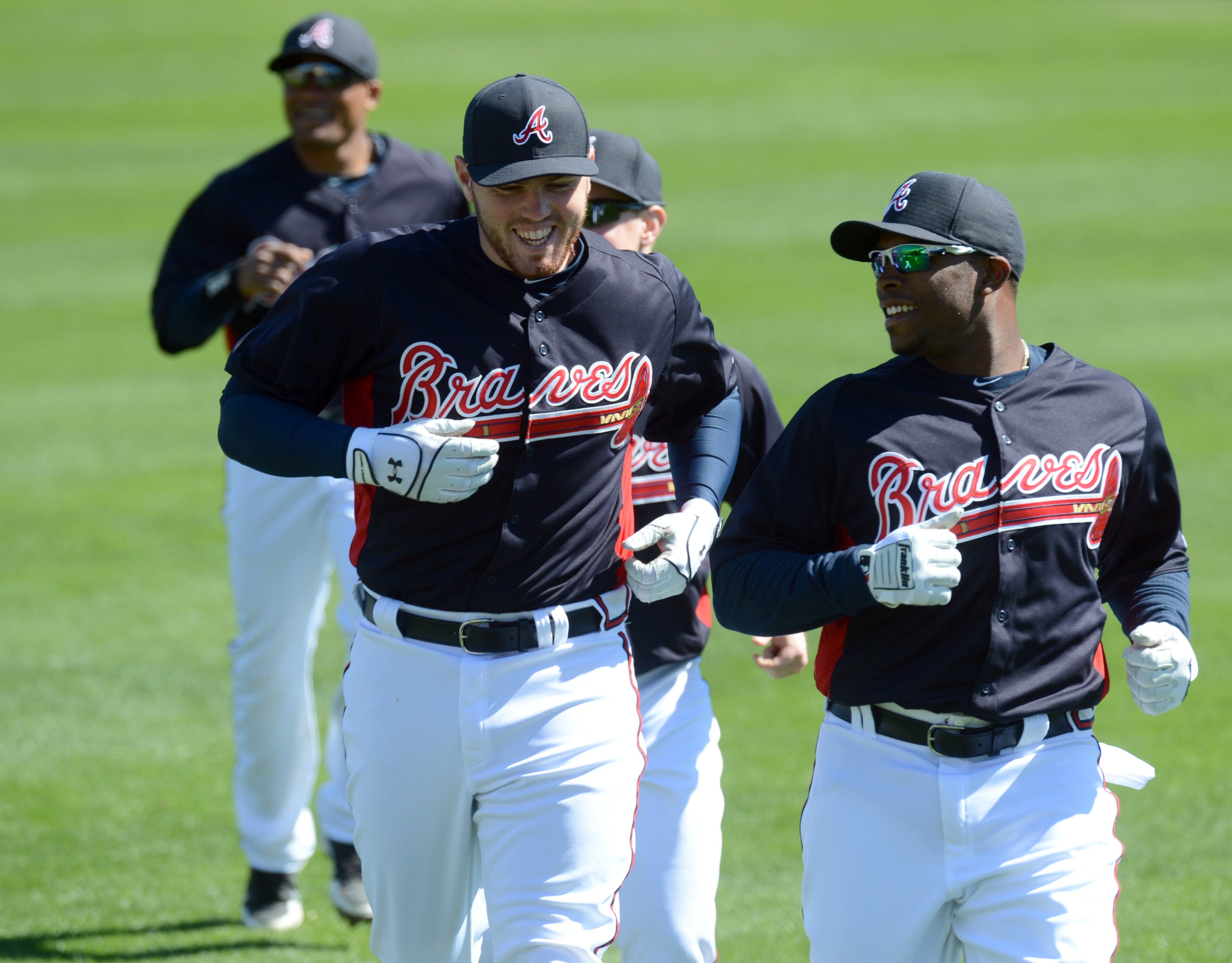 February 17, 2013 Lake Buena Vista, Fl: Atlanta Braves infielder Freddie Freeman (left) and Atlanta Braves outfielder Justin Upton warm up during the third full squad workout at Champion Stadium in the ESPN Wide World of Sports Complex in Lake Buena Vista, Fl., on Sunday, Feb. 17, 2013. HYOSUB SHIN / HSHIN@AJC.COM
