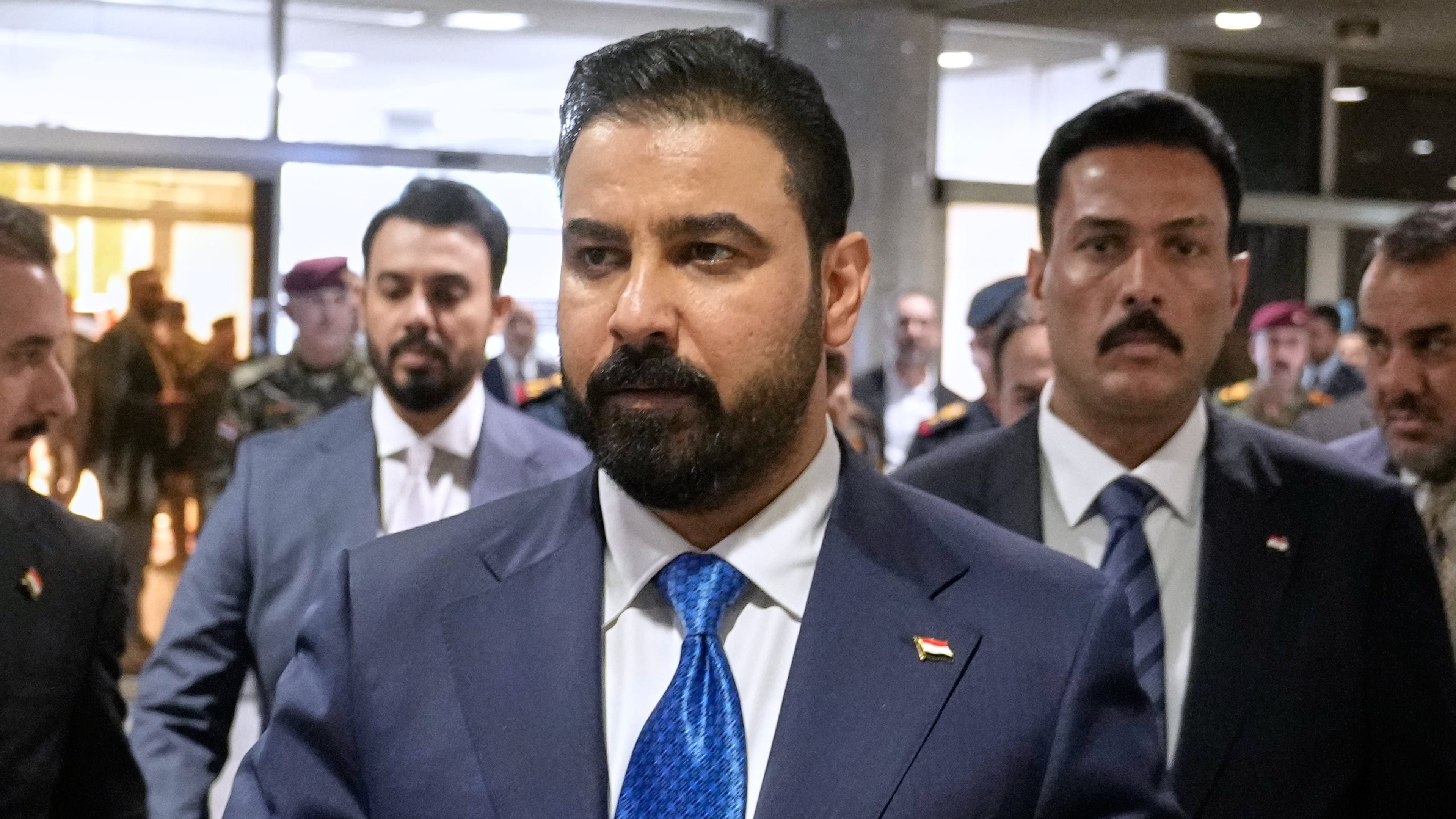 FILE - Iraq's Prime Minister-designate Ali al-Zaidi arrives at the Iraqi parliament to attend the voting of his government in Baghdad, Iraq, May 14, 2026. (AP Photo/Hadi Mizban, File)