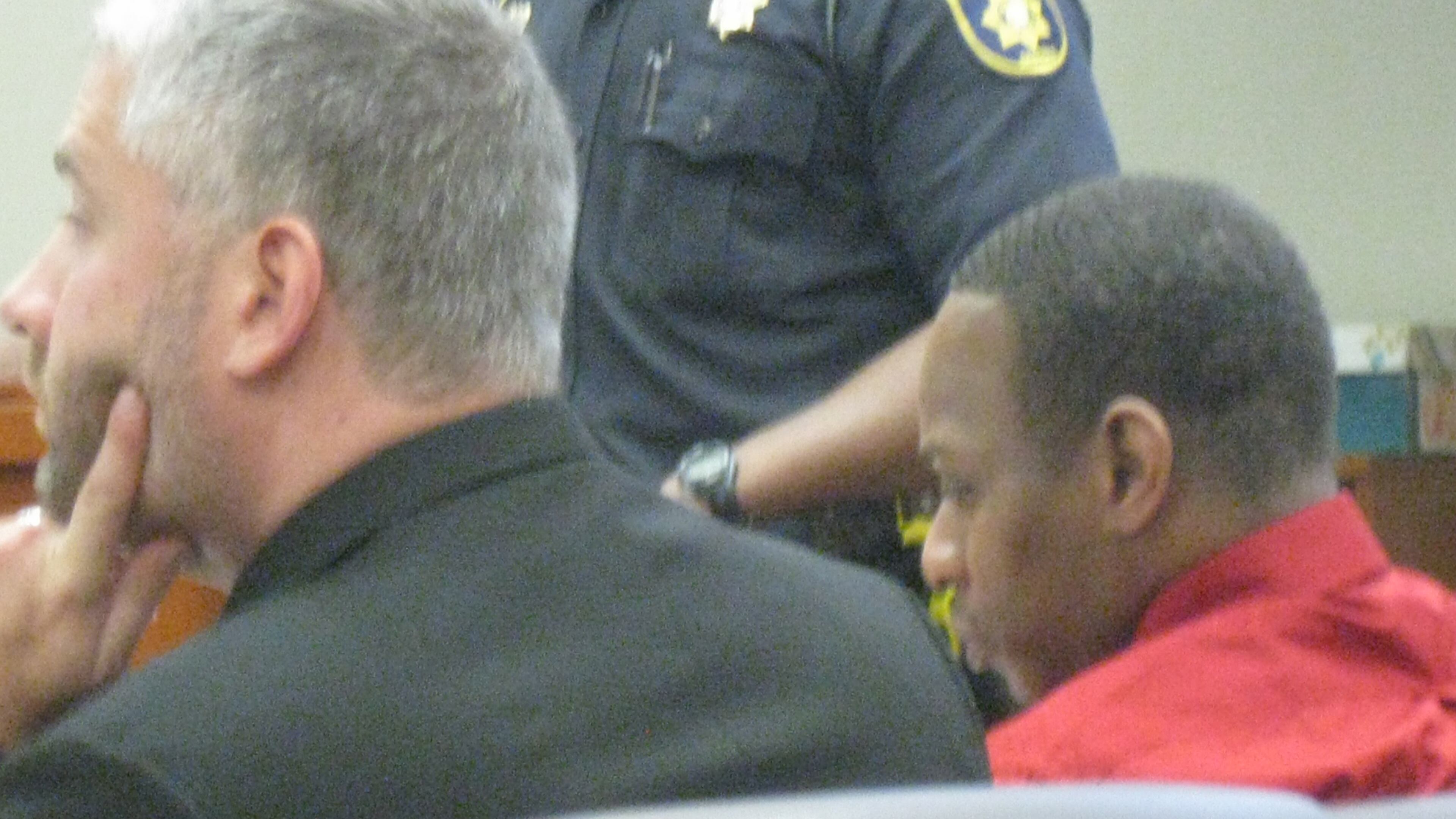 Quentric Williams is escorted from a DeKalb County courtroom during a break in his murder trial. Williams is accused of killing martial arts expert Mitt Lenix in the early morning hours of May 15, 2012, at the Starlight Drive-in theater on Moreland Drive. Then, prosecutors say, he led police on a high-speed chase through DeKalb County to Gwinnett.Quentric Williams, right, sits with his attorney Russell Z. Hetzel as a police officer testifies during Williams’ murder trial. Williams is accused of killing martial arts expert Mitt Lenix in the early morning hours of May 15, 2012, at the Starlight Drive-in theater on Moreland Drive. Then, prosecutors say, he led police on a high-speed chase through DeKalb County to Gwinnett.