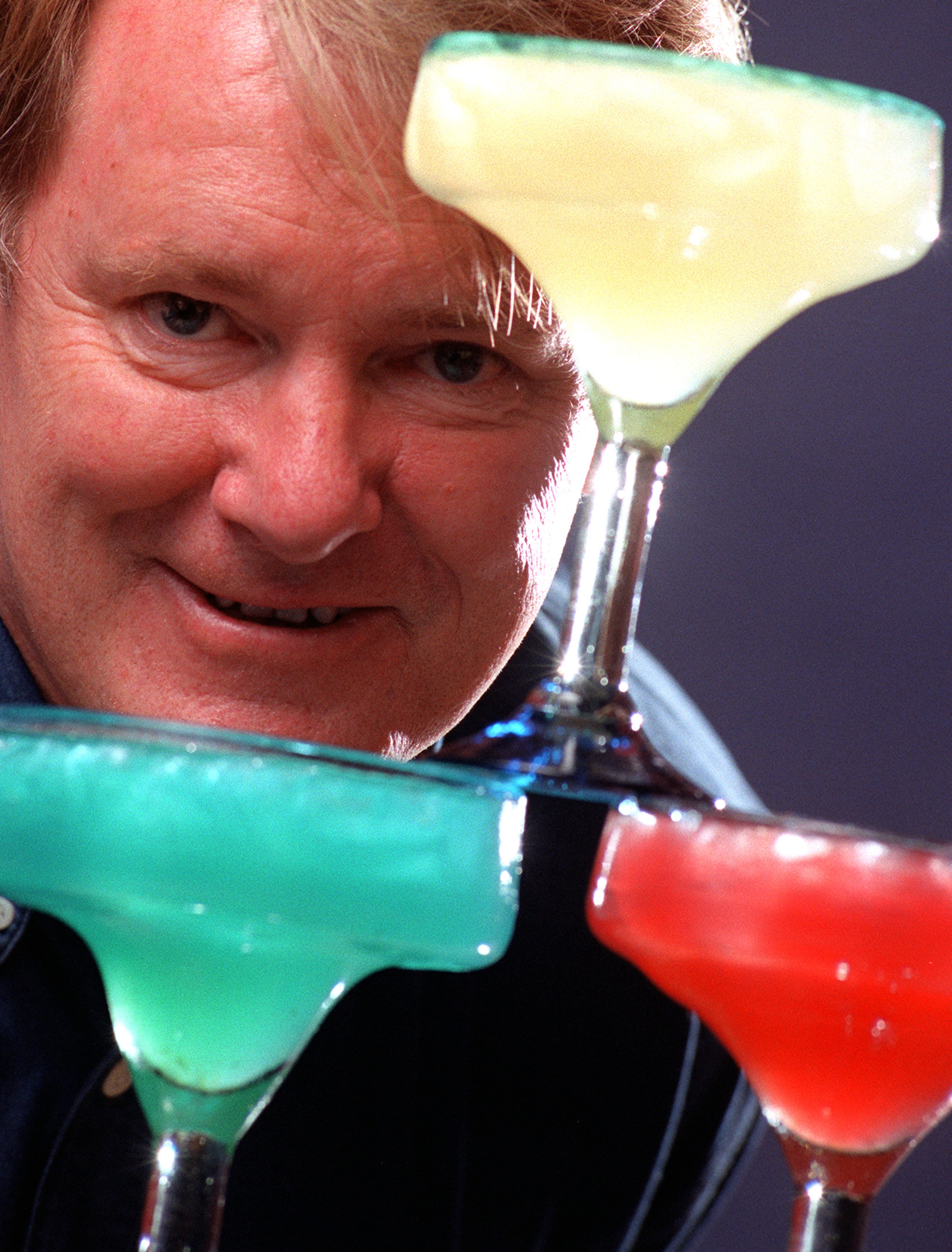 Owner and chef Tom Catherall posed with margaritas at the Virginia-Highland location when it opened in 1999. (File photo)