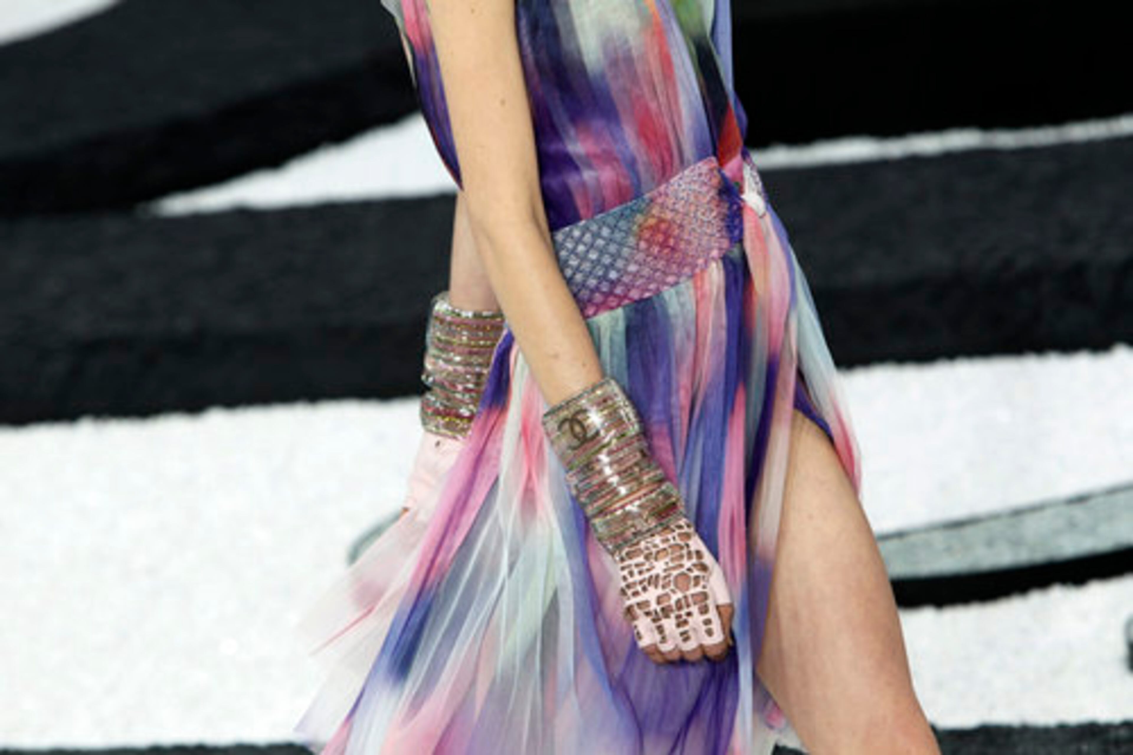 A series of floaty dresses in saturated watercolor print silk injected the collection with a dose of color.