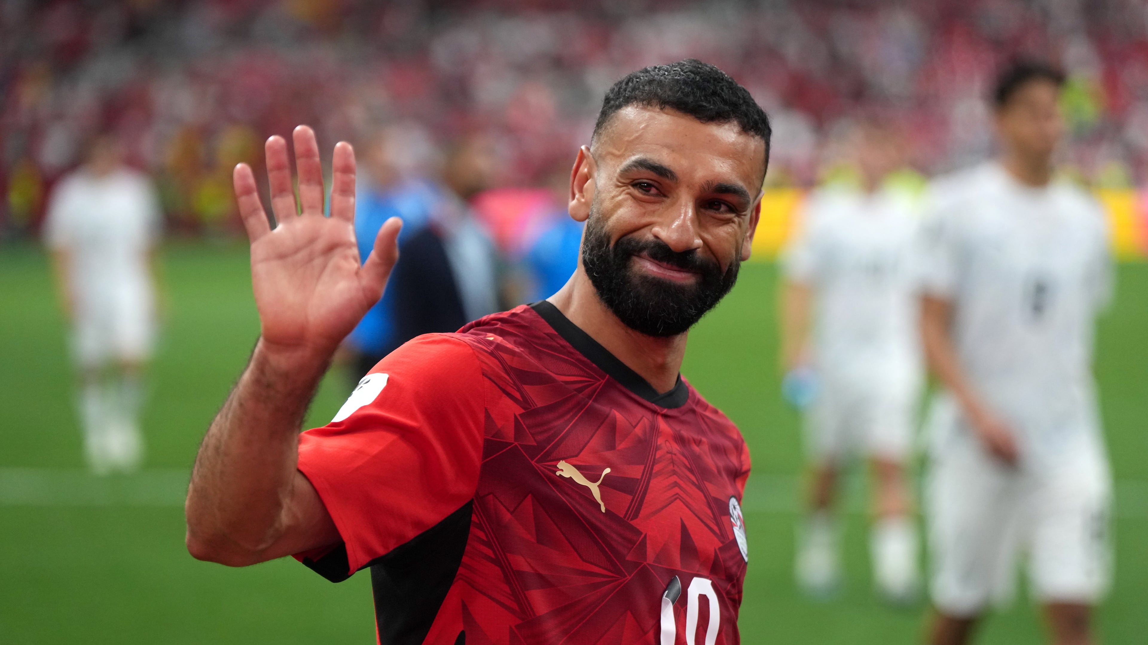 Egypt's Mohamed Salah (10) smiles and waves to fans as he leaves the field following the team's victory in the World Cup Group G soccer match between New Zealand and Egypt in Vancouver, British Columbia, Sunday, June 21, 2026. (Darryl Dyck/The Canadian Press via AP)