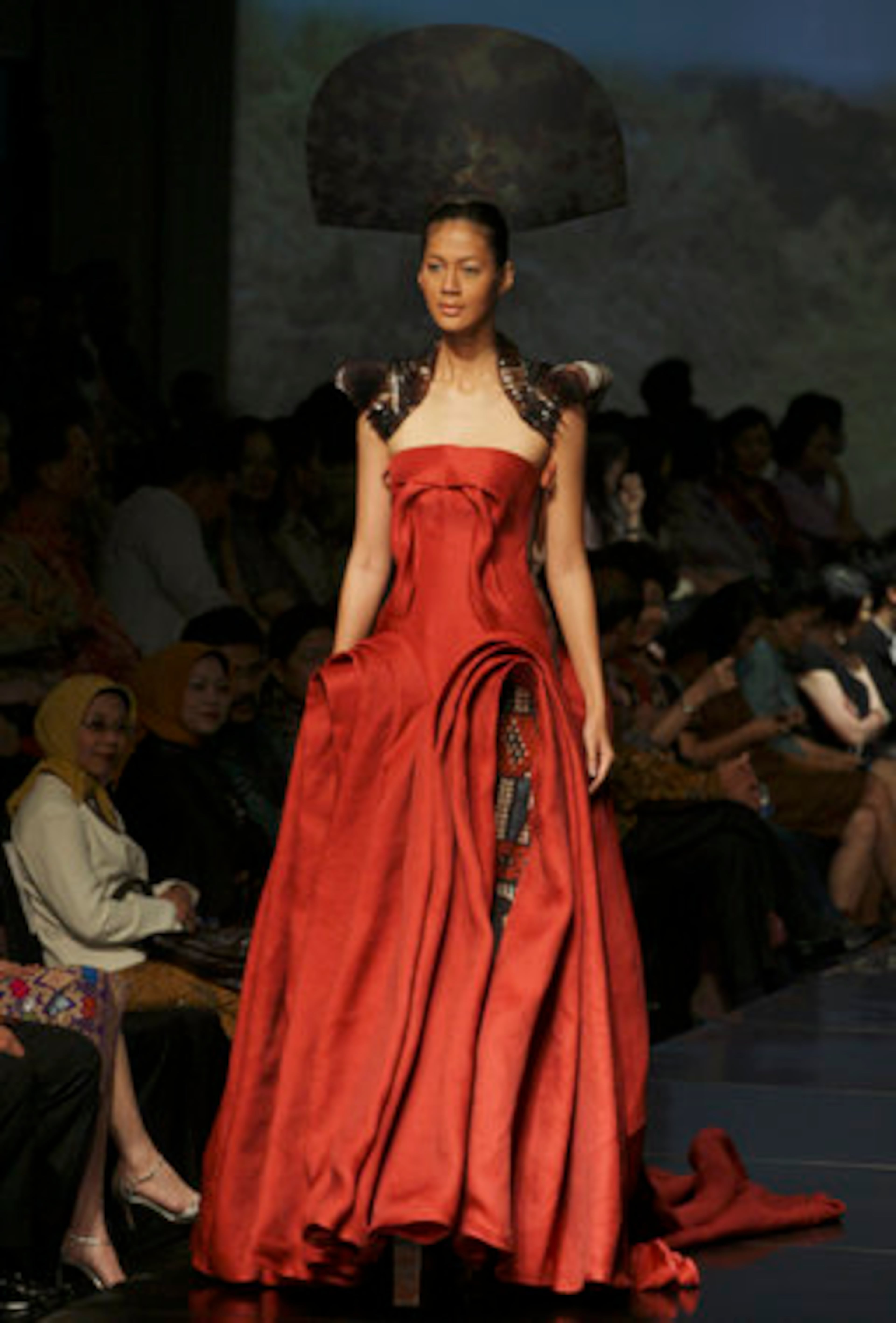 A model displays a creation by Indonesian designer Adrian Gan during Jakarta Fashion and Food Festival in Jakarta, Indonesia, Wednesday, May 25, 2011.
