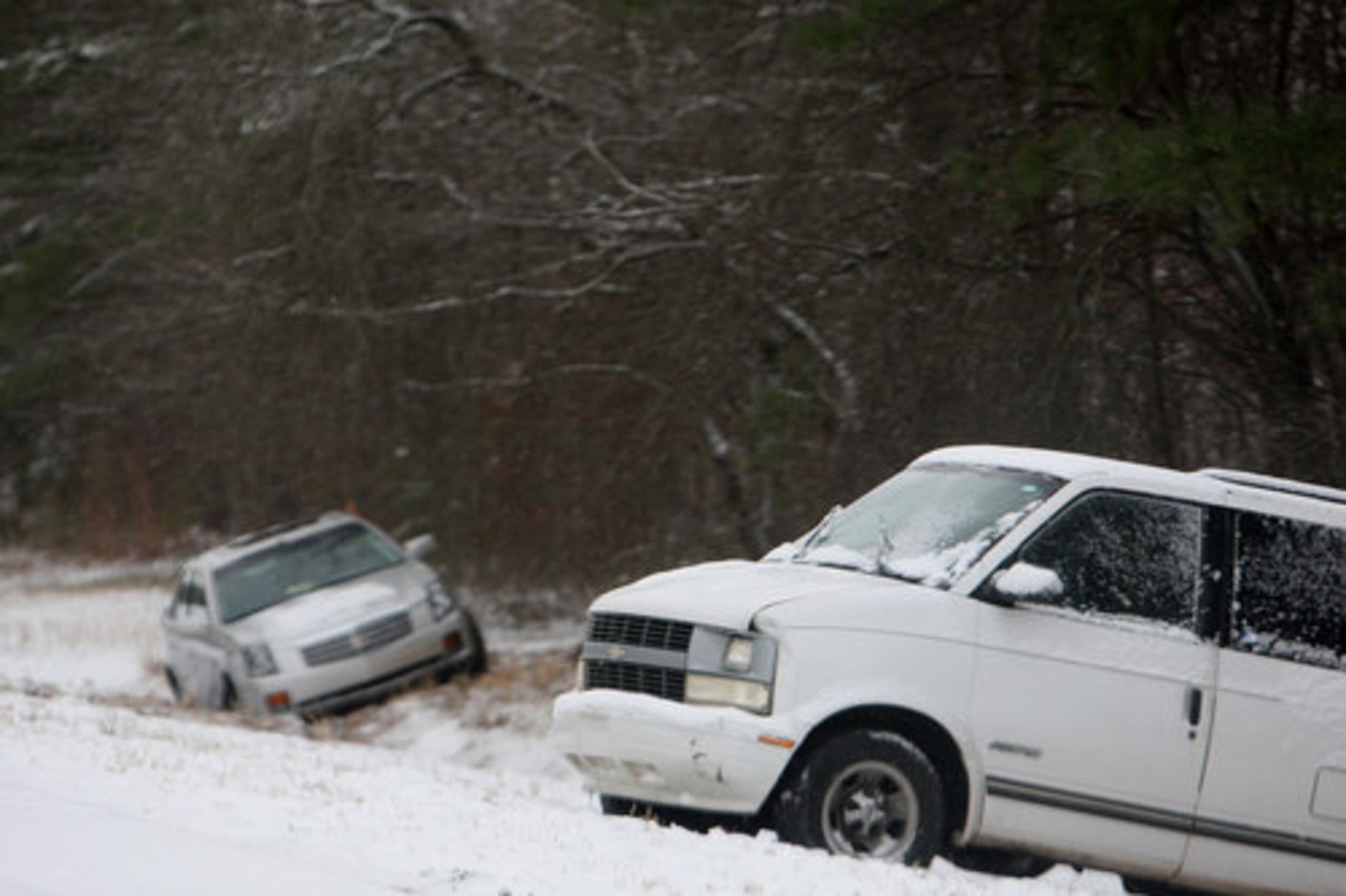 Vehicle sit along I-85 near Hamilton Mill Road on Sunday morning.