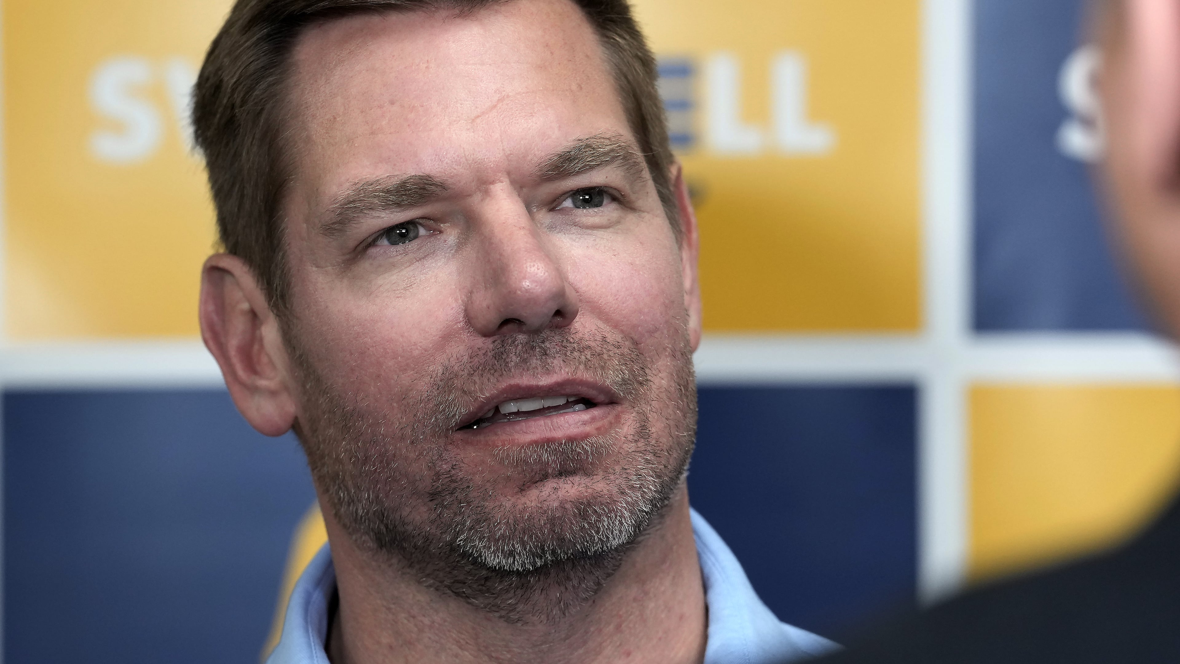 FYI - Rep. Eric Swalwell, D-Calif., talks with reporters after holding a town hall meeting in Sacramento, Calif., April 7, 2026. (AP Photo/Rich Pedroncelli, File)