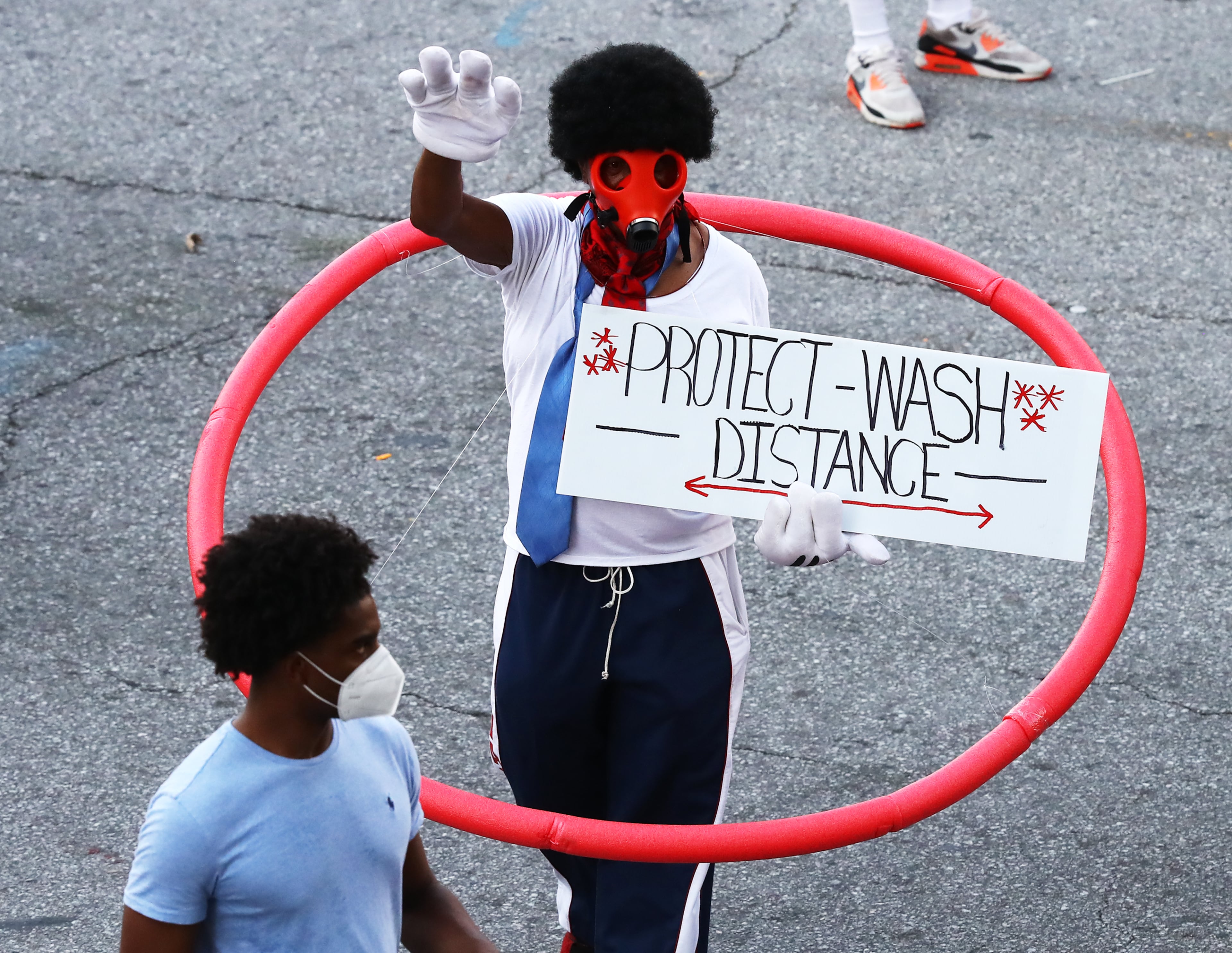 060220 Atlanta: More than 2000 protesters fill Marietta Street at Centennial Olympic Park Drive outside the CNN Center at Olympic Park during a fifth day of protests over the death of George Floyd on Tuesday, June 2, 2020, in Atlanta. Curtis Compton ccompton@ajc.com