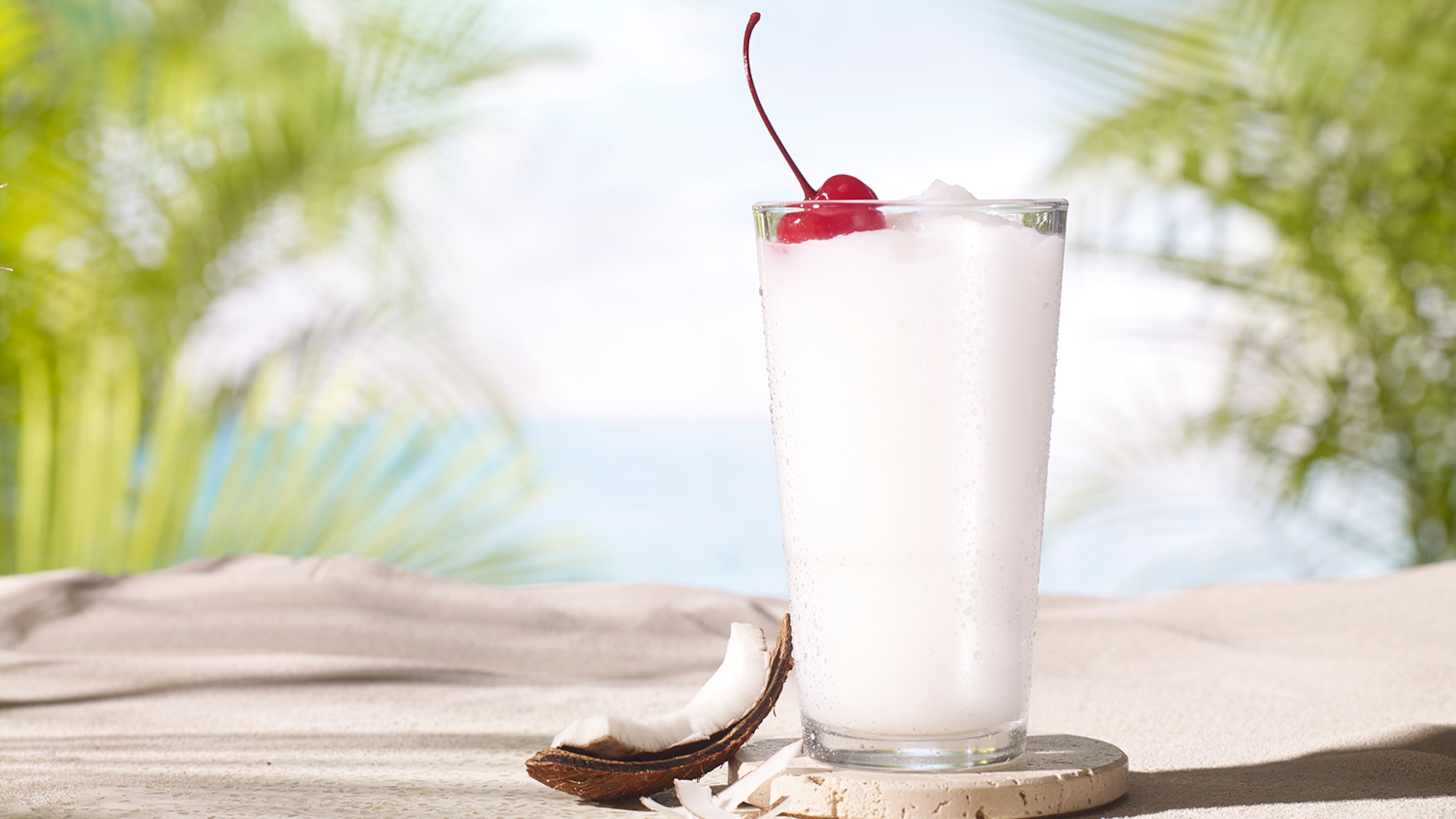 The frozen pina colada is one of a few new slushy summer cocktails at Topgolf. (Courtesy of Topgolf)