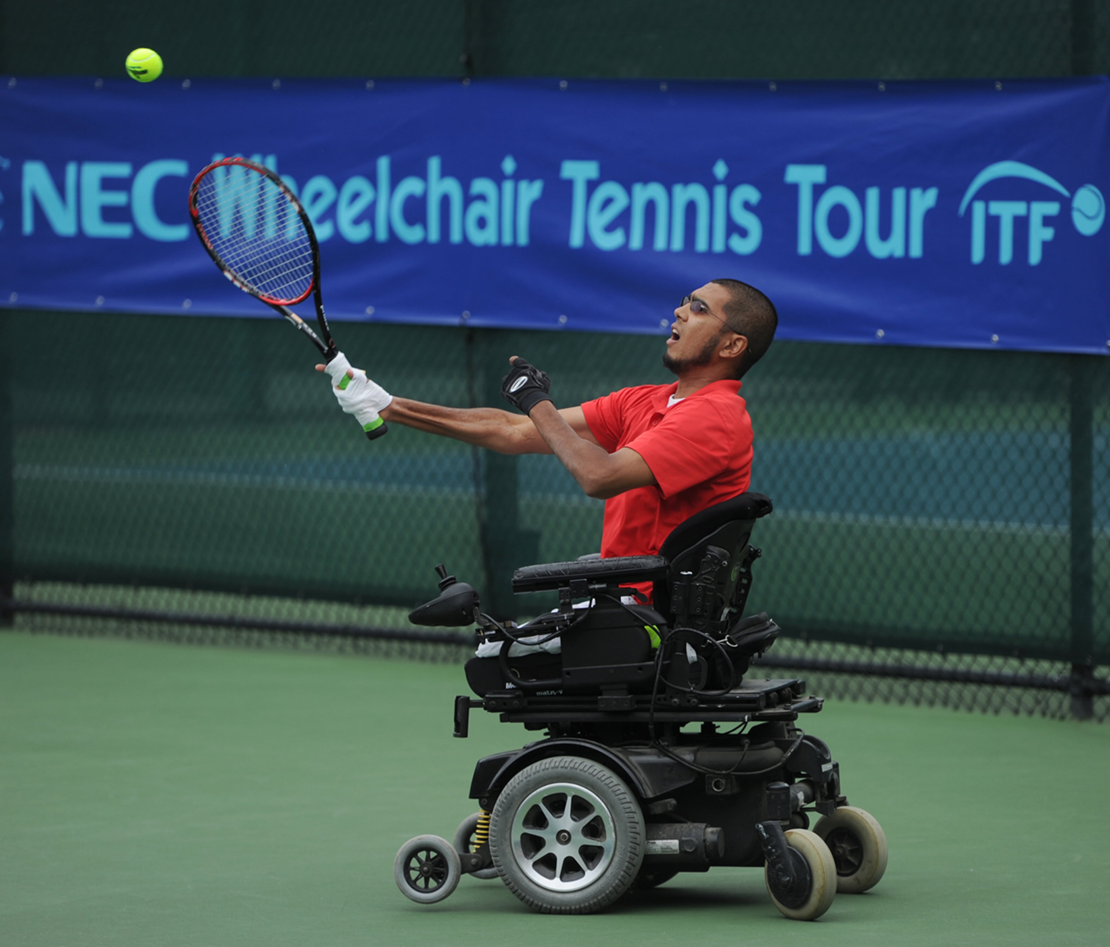 M. Shoeb Khan serves the ball during the Atlanta Open Wheelchair Tennis Championships at the Dunwoody Country Club on Wednesday, May 1, 2013. JOHNNY CRAWFORD / JCRAWFORD@AJC.COM