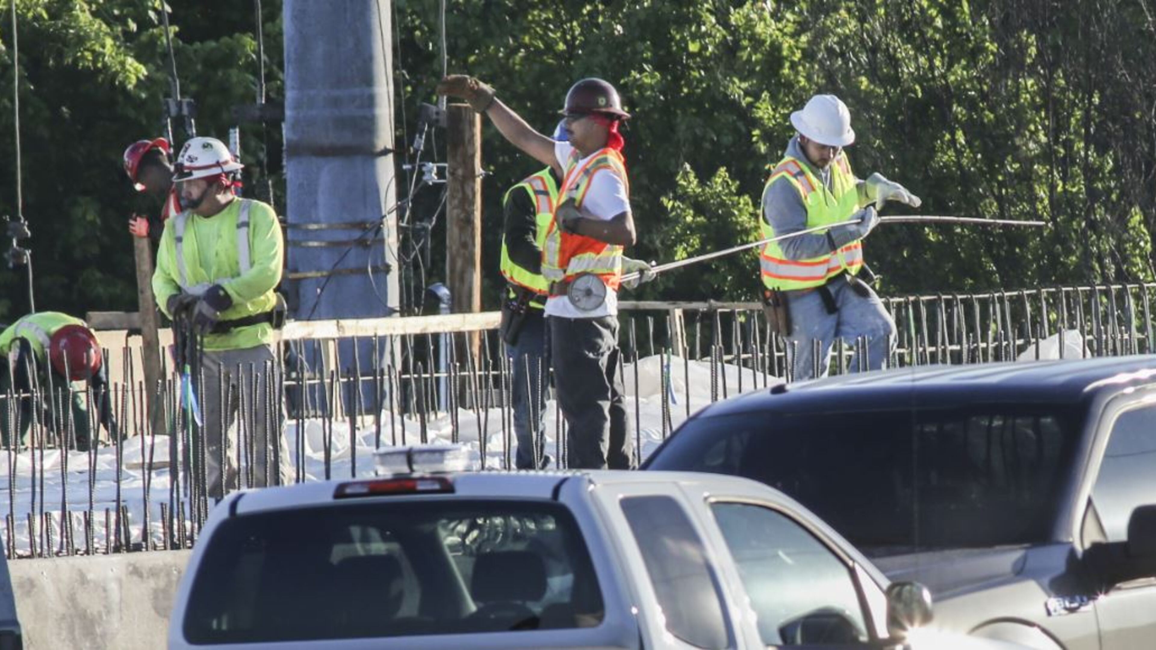 Construction crews hard at it Monday, May 8, 2017, getting the median wall between southbound and northbound I-85 ready for concrete. Contractor C.W. Matthews is rebuilding 350 feet of northbound and 350 feet of southbound lanes on I-85. JOHN SPINK/AJC