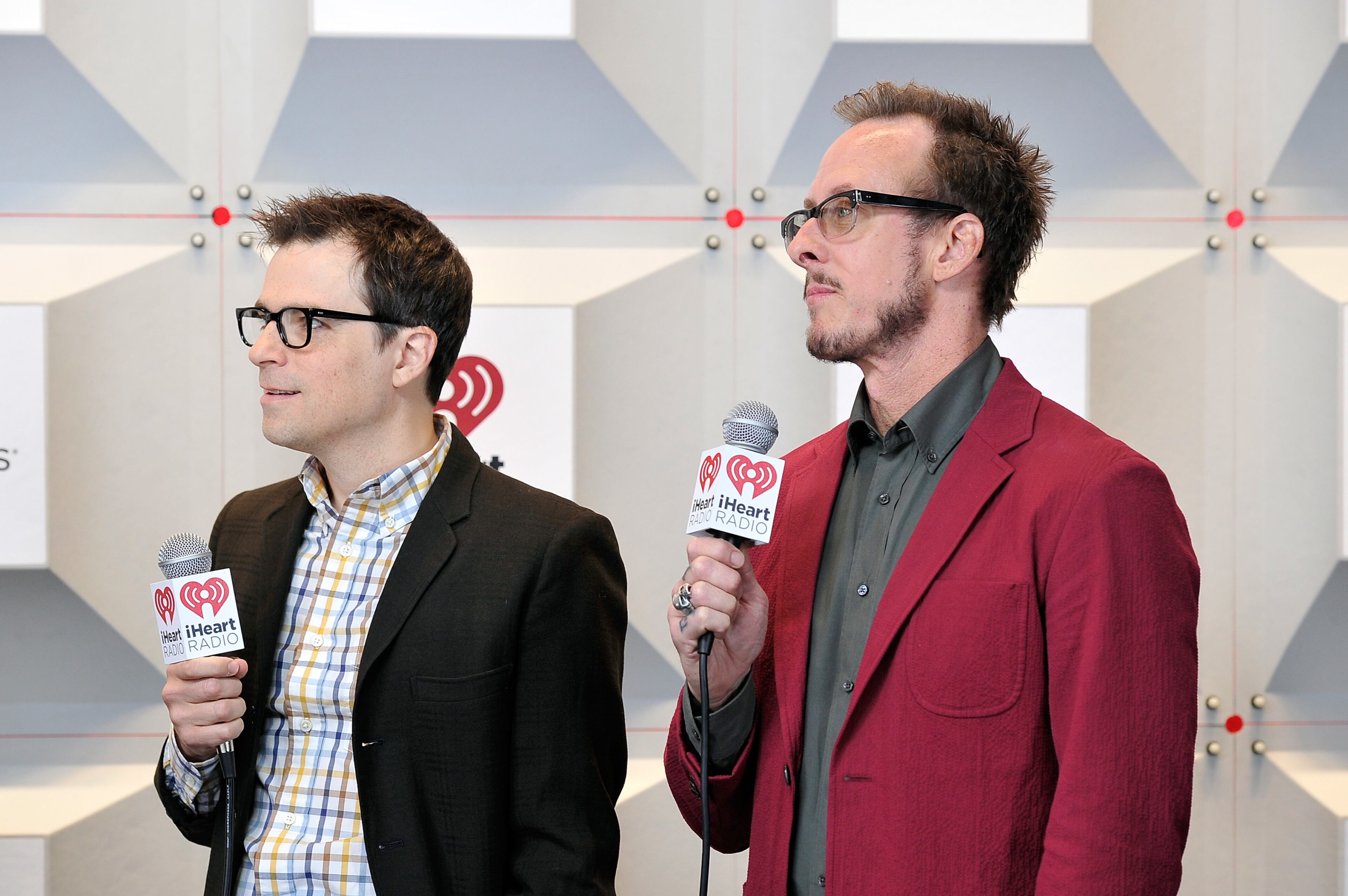 LAS VEGAS, NV - SEPTEMBER 20: Recording artists Rivers Cuomo (L) and Scott Shriner of the music group Weezer attend the 2014 iHeartRadio Music Festival at the MGM Grand Garden Arena on September 20, 2014 in Las Vegas, Nevada. (Photo by David Becker/Getty Images for Clear Channel)