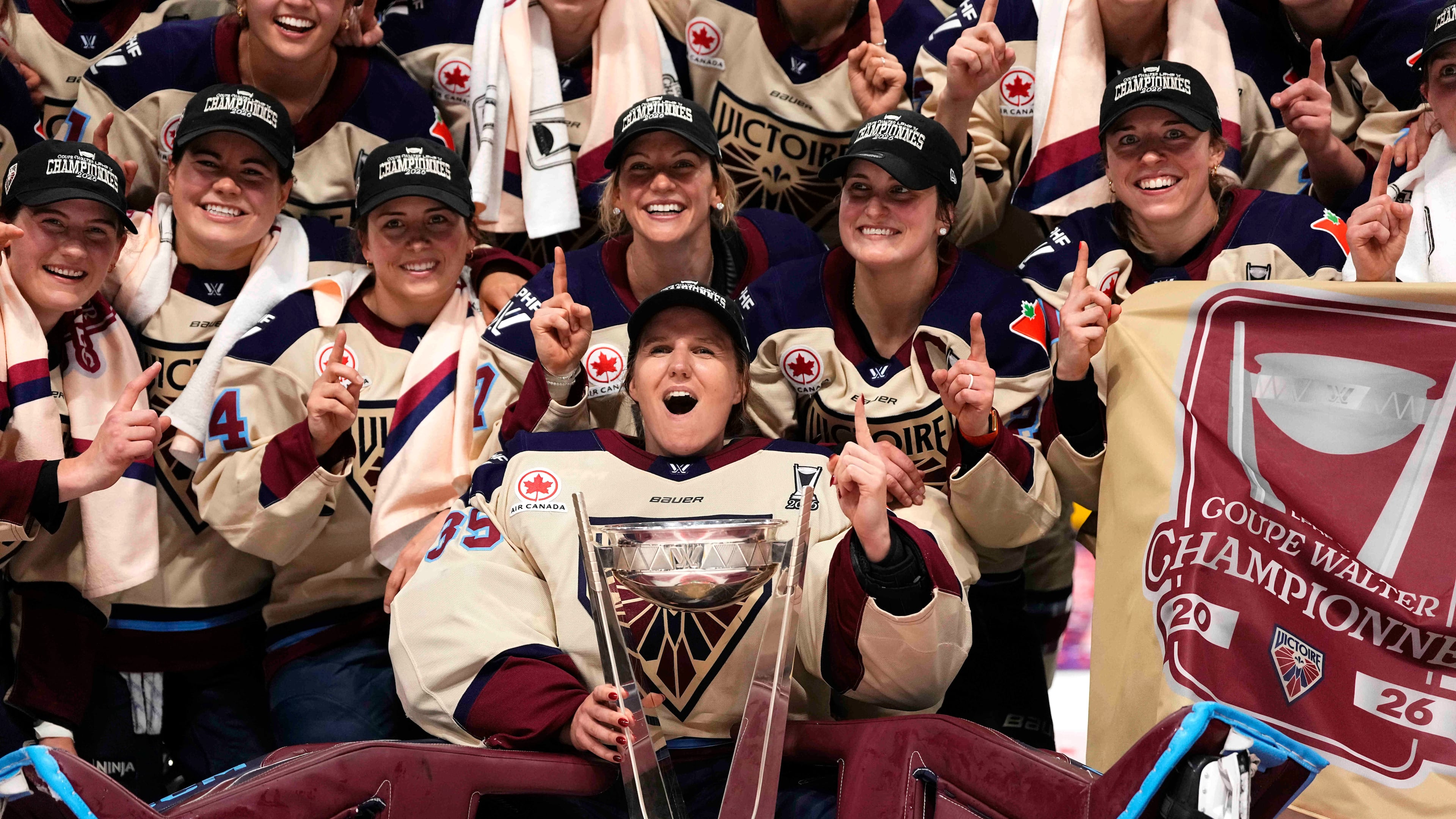 FILE - The Montreal Victoire pose for a photo with the PWHL Walter Cup after the team's win against the Ottawa Charge, in Ottawa, May 20, 2026. (Justin Tang/The Canadian Press via AP, File)