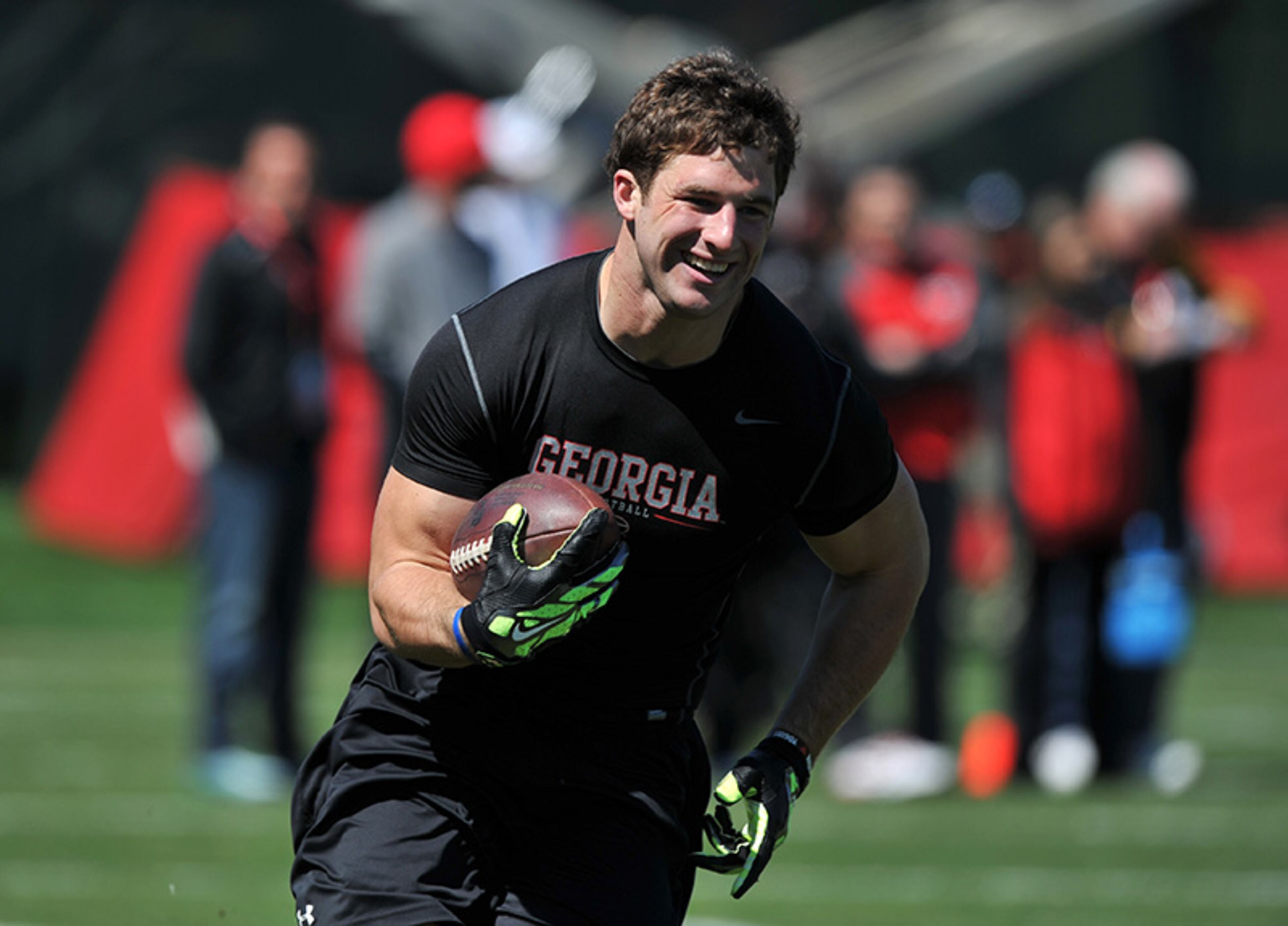 Former Georgia tight end Arthur Lynch works out in front of NFL scouts during Georgia's Pro Day Wednesday, April 16, 2014, in Athens. .