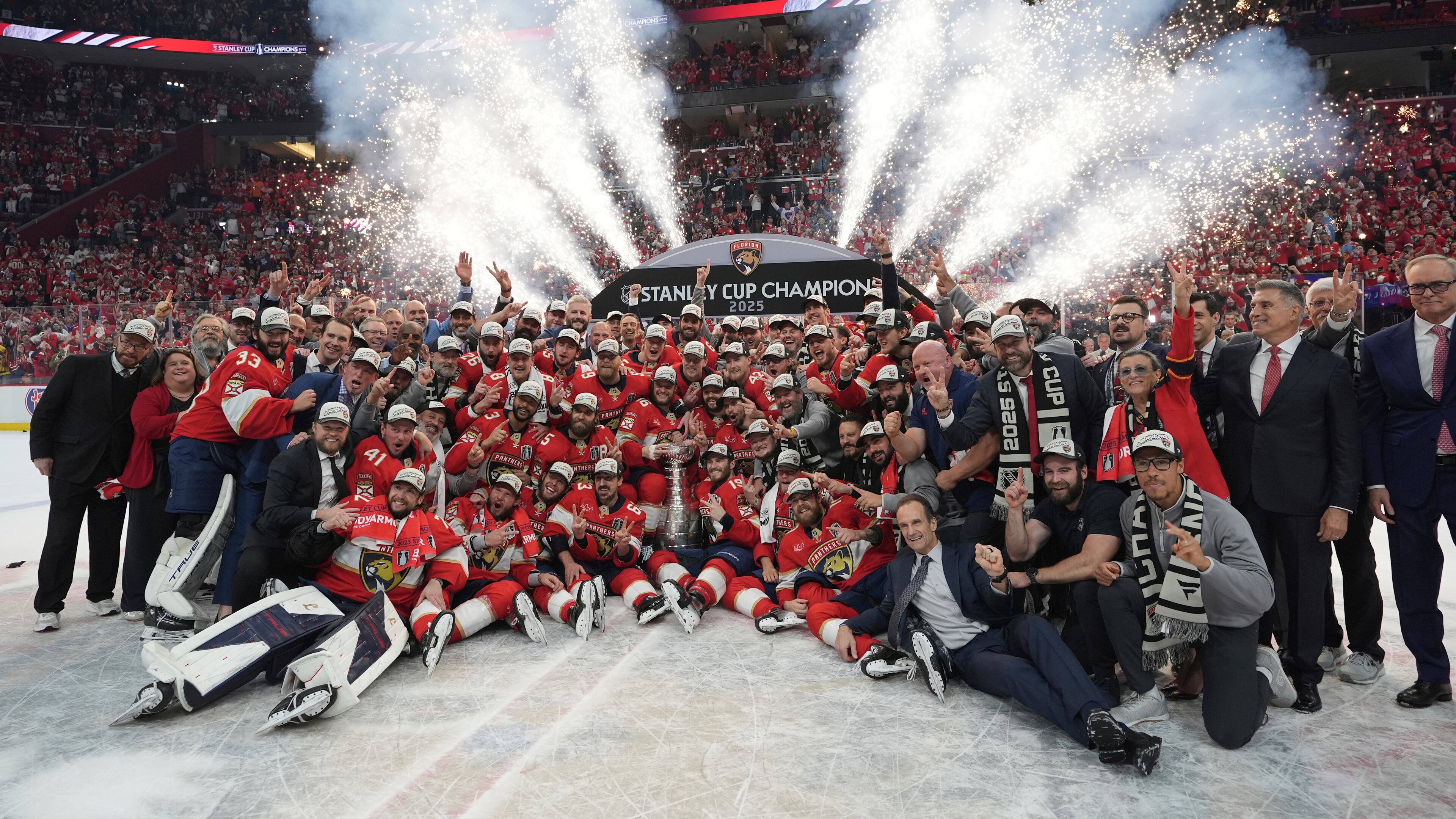 FILE - The Florida Panthers team poses with the Stanley Cup trophy after defeating the Edmonton Oilers in Game 6 of the NHL hockey Stanley Cup Final, June 17, 2025, in Sunrise, Fla. (AP Photo/Lynne Sladky, File)