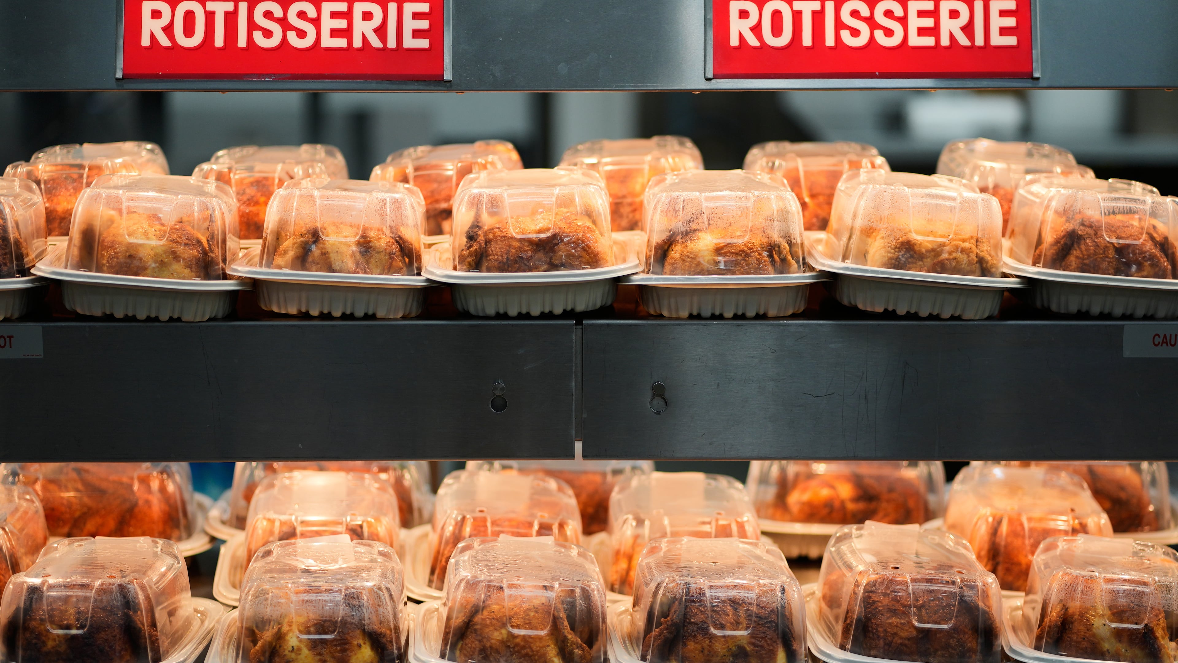 FILE - Rotisserie chickens are on display at a Sam's Club, Sept. 24, 2025, in Bentonville, Ark. (AP Photo/Charlie Riedel, File)