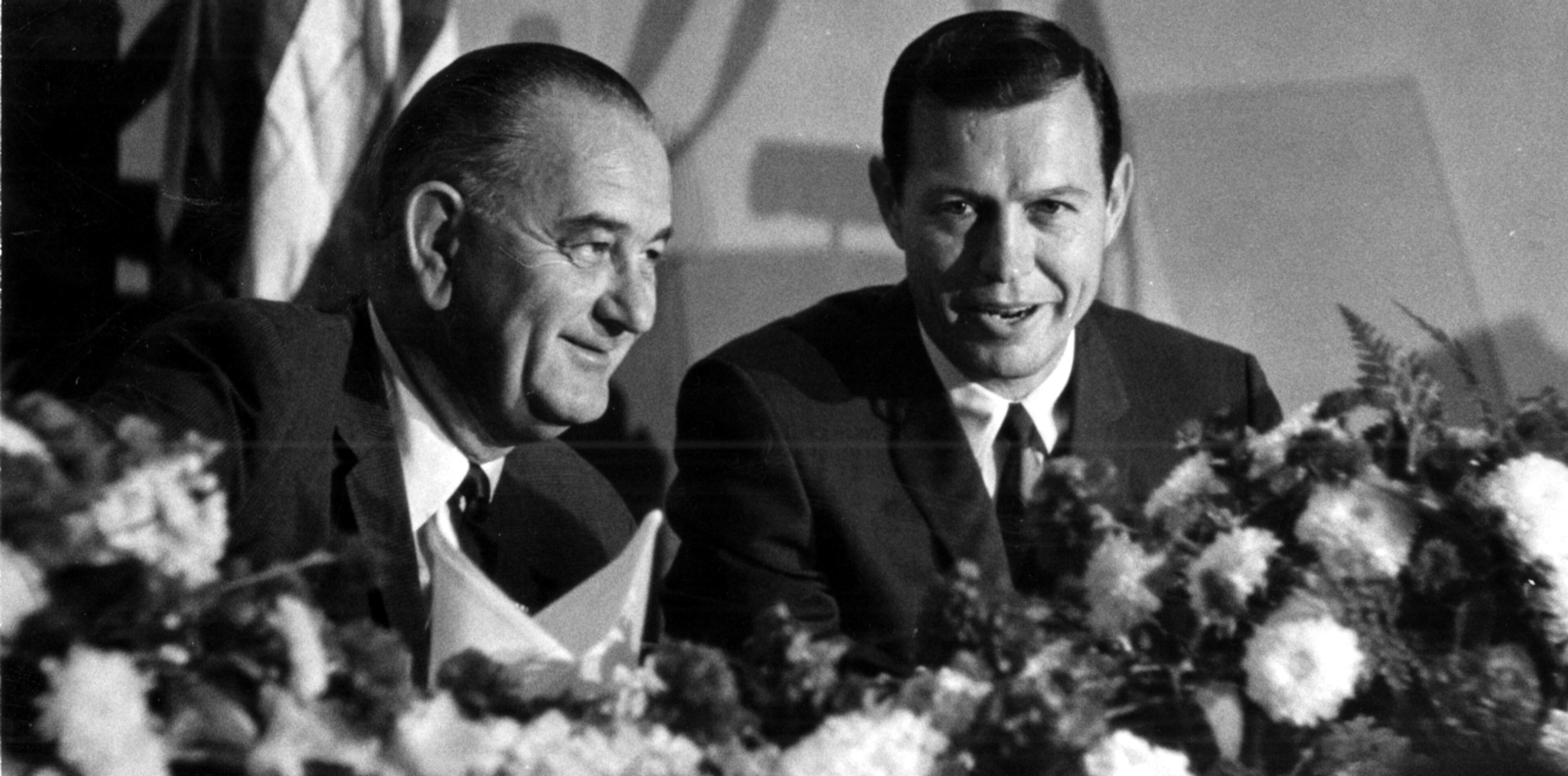 President Lyndon Johnson and Gov. Carl Sanders exchange small talk during a breakfast meeting in May 1964. (AJC file photo)