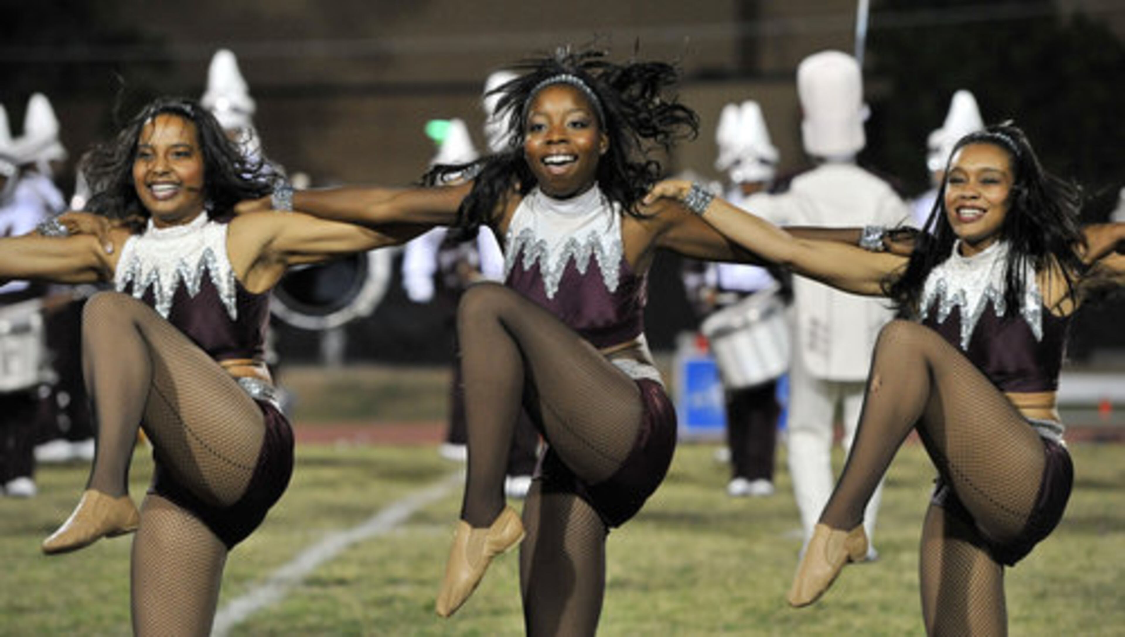 Morehouse marching band members perform during the half time show of the game against the Clark Atlanta at B.T. Harvey Stadium in Morehouse College on Thursday, September 29, 2011.