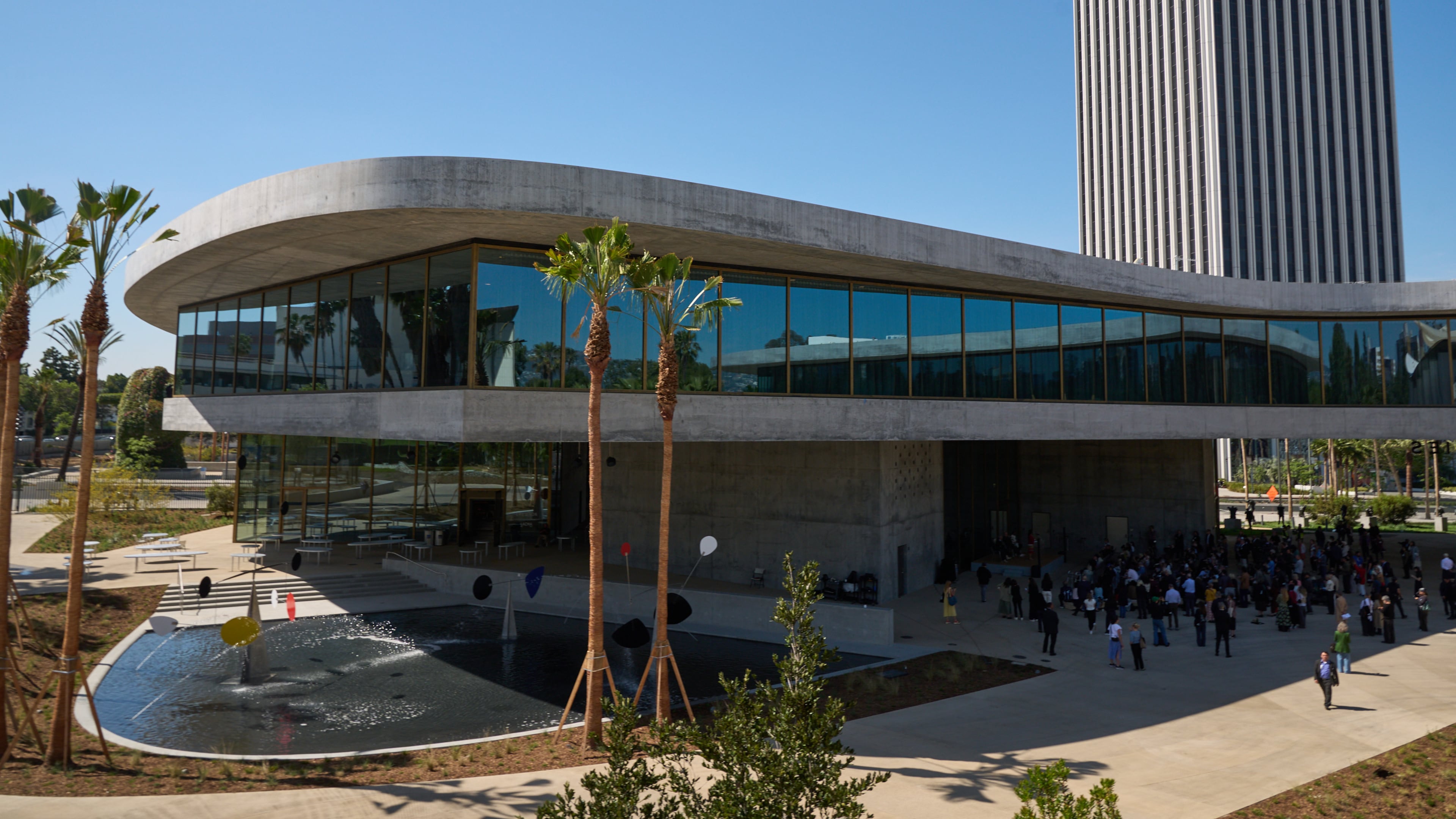 People attend the inaugural ceremony for the David Geffen Galleries at the Los Angeles County Museum of Art on Wednesday, April 15, 2026. (AP Photo/Damian Dovarganes)