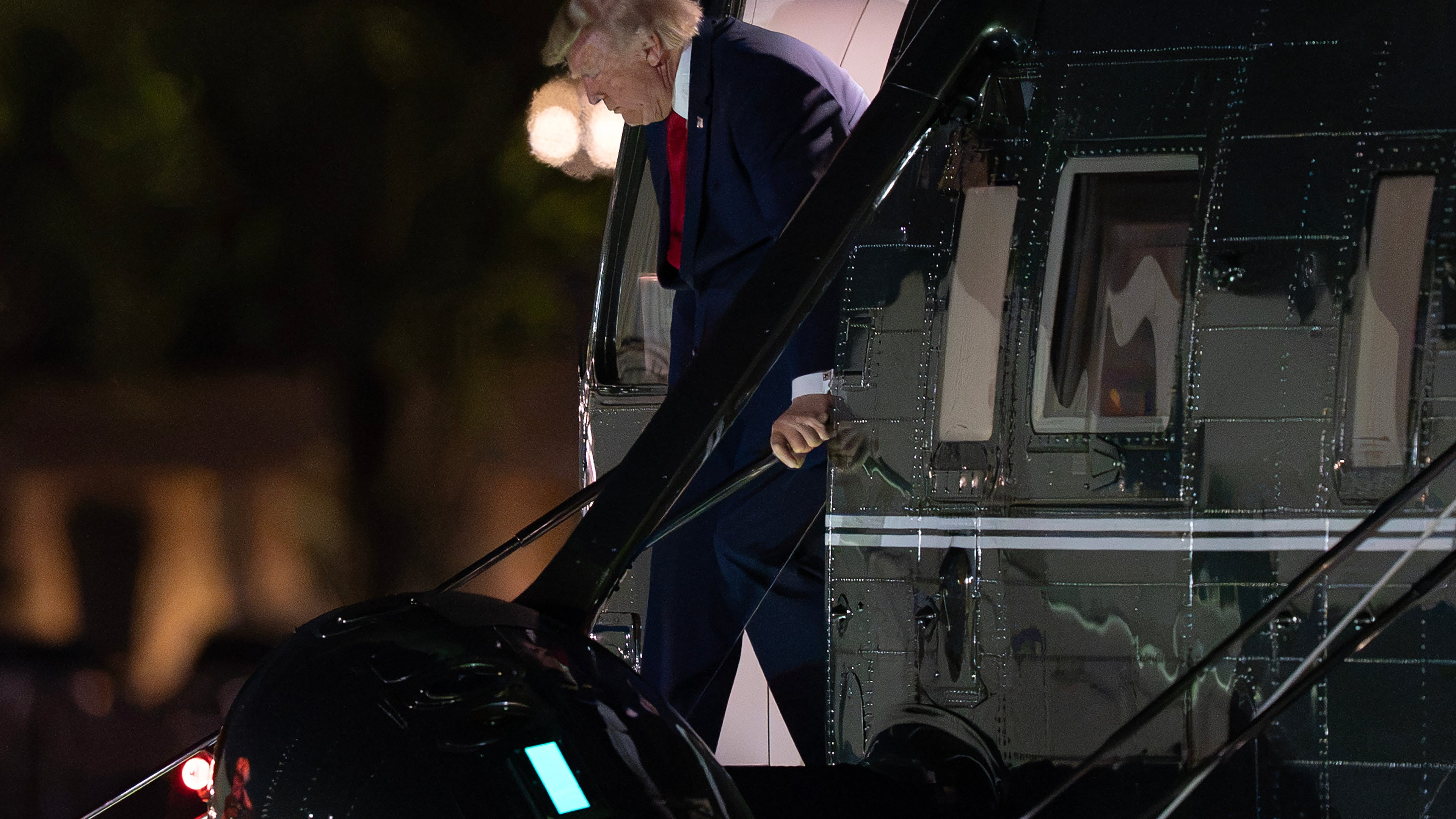President Donald Trump steps off from Marine One upon his arrival at the Ellipse just outside of the White House, Wednesday, Aug. 5, 2026, in Washington. (AP Photo/Jose Luis Magana)