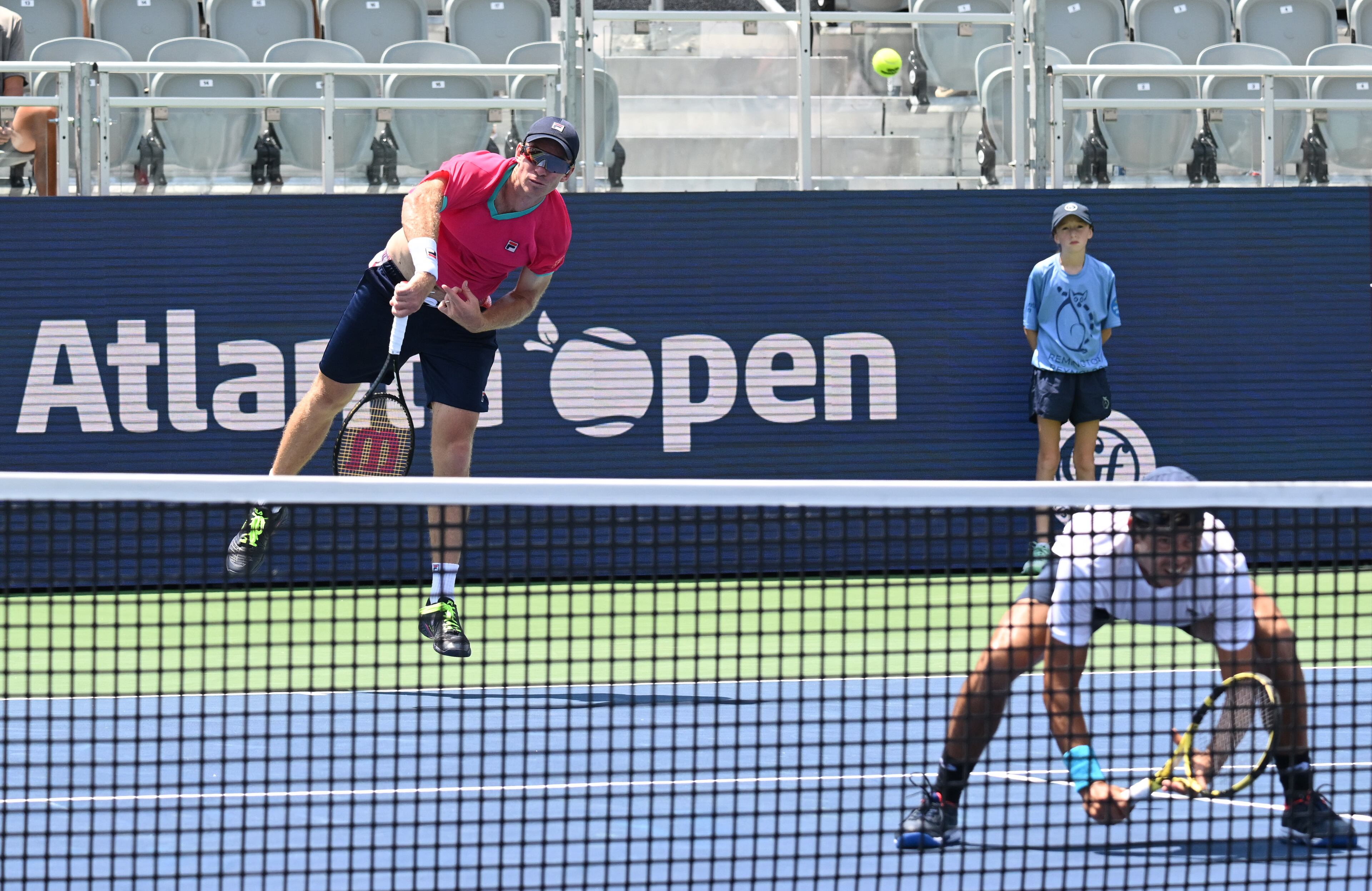 John Peers (AUS) serves as he and Jason Kubler (right) play against Christopher Eubanks (USA) and Mackenzie McDonald (USA) during a men doubles semifinal match at the 2022 Atlanta Tennis Open at Atlantic Station on Saturday, July 30, 2022. (Hyosub Shin / Hyosub.Shin@ajc.com)
