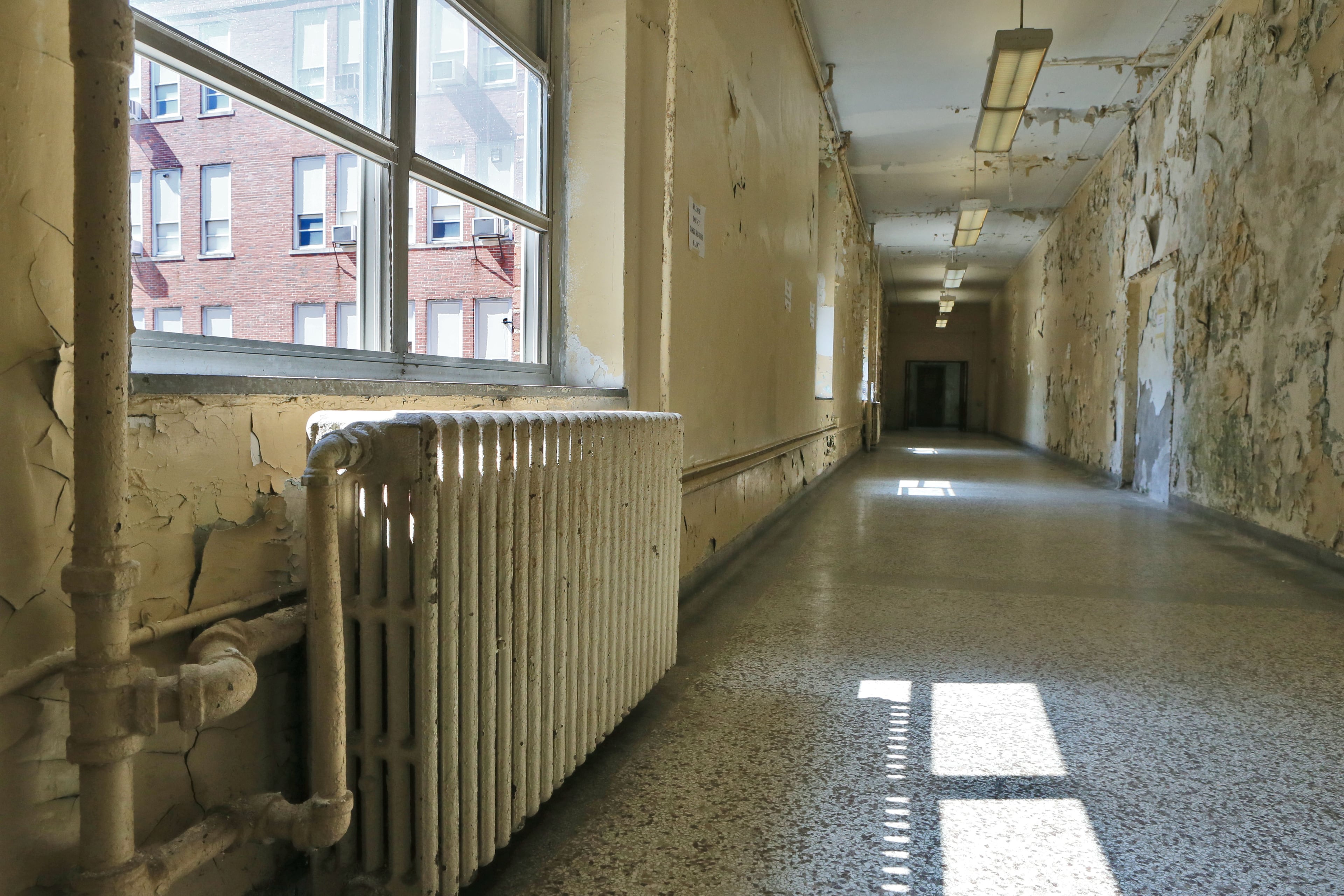 FROM 2016 -- HOW IT LOOKED THEN: Sunlight brightens a dreary second floor hallway.