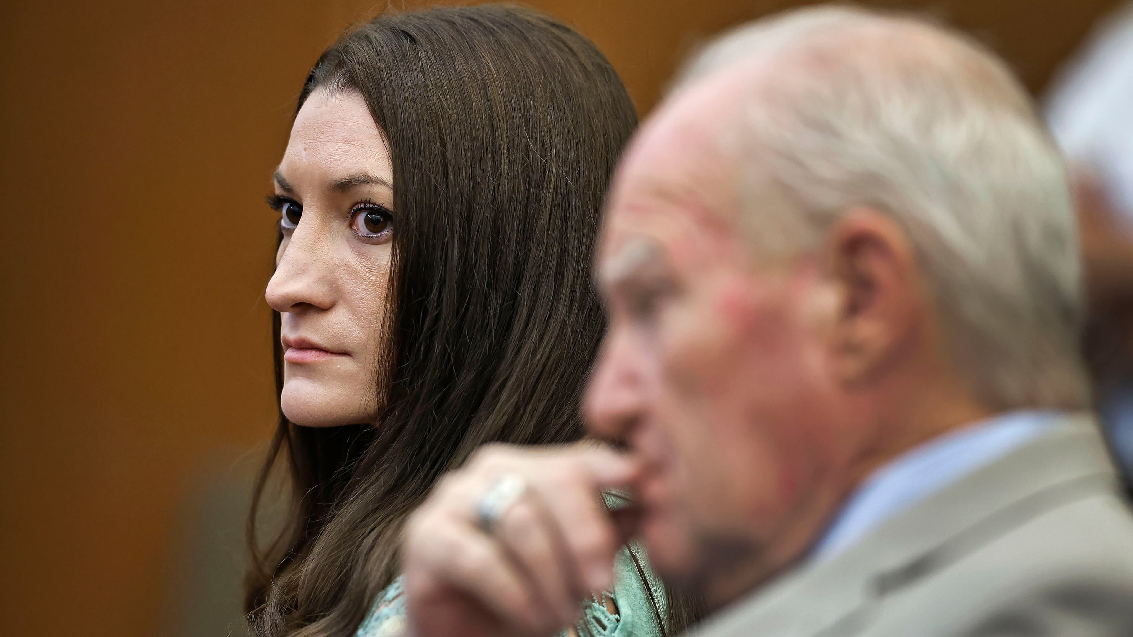 Lindsay Clancy watches jurors enter the courtroom for their second day of deliberations as defense attorney Kevin Reddington sits to her right at Plymouth Superior Court in Plymouth, Mass., Friday, Aug. 28, 2026. (Greg Derr/The Patriot Ledger via AP, Pool)
