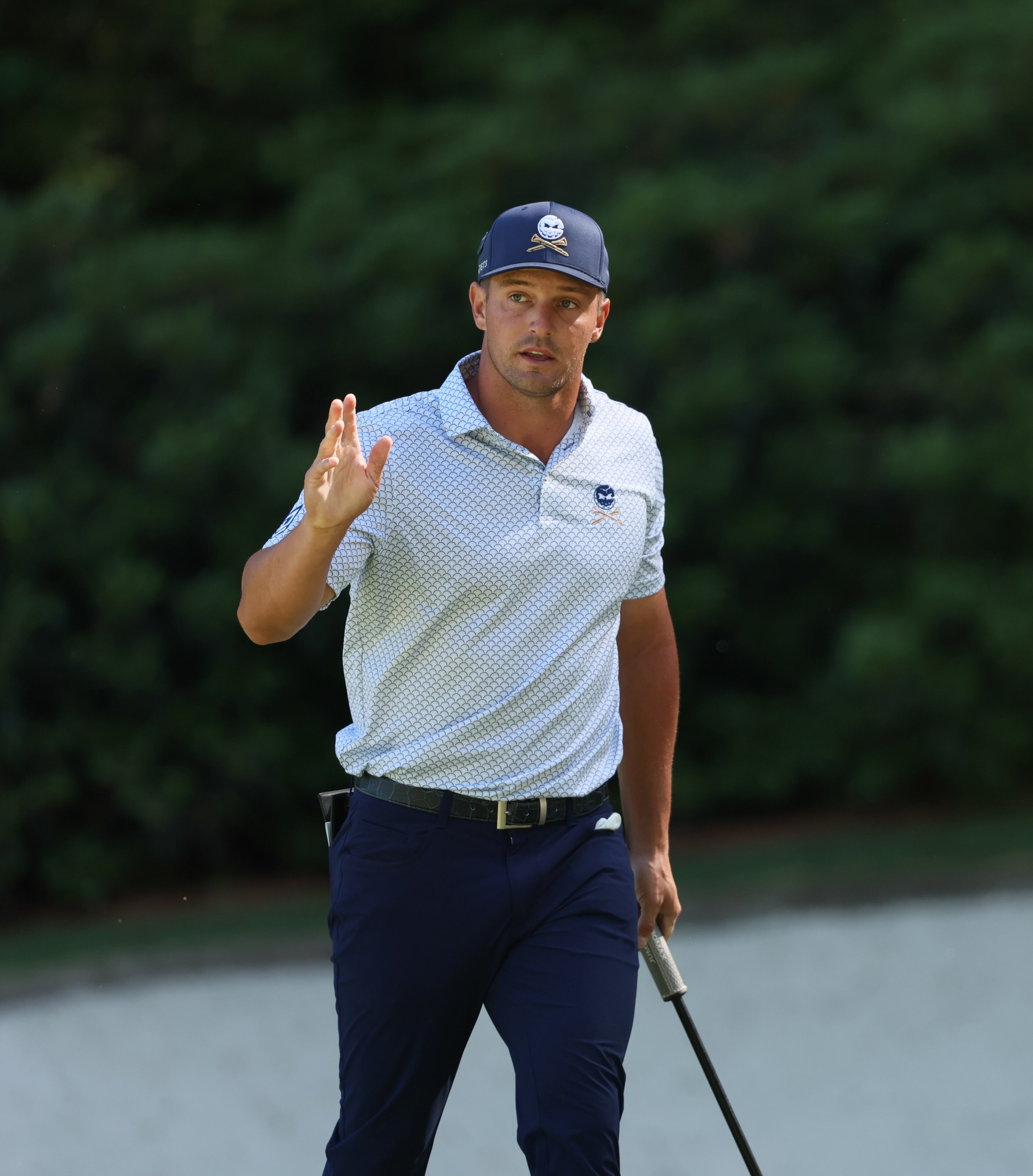Bryson DeChambeau reacts to making putt for birdie on 13th hole during second round of the 2024 Masters Tournament at Augusta National Golf Club, Friday, April 12, 2024, in Augusta, Ga. Jason Getz / Jason.Getz@ajc.com)