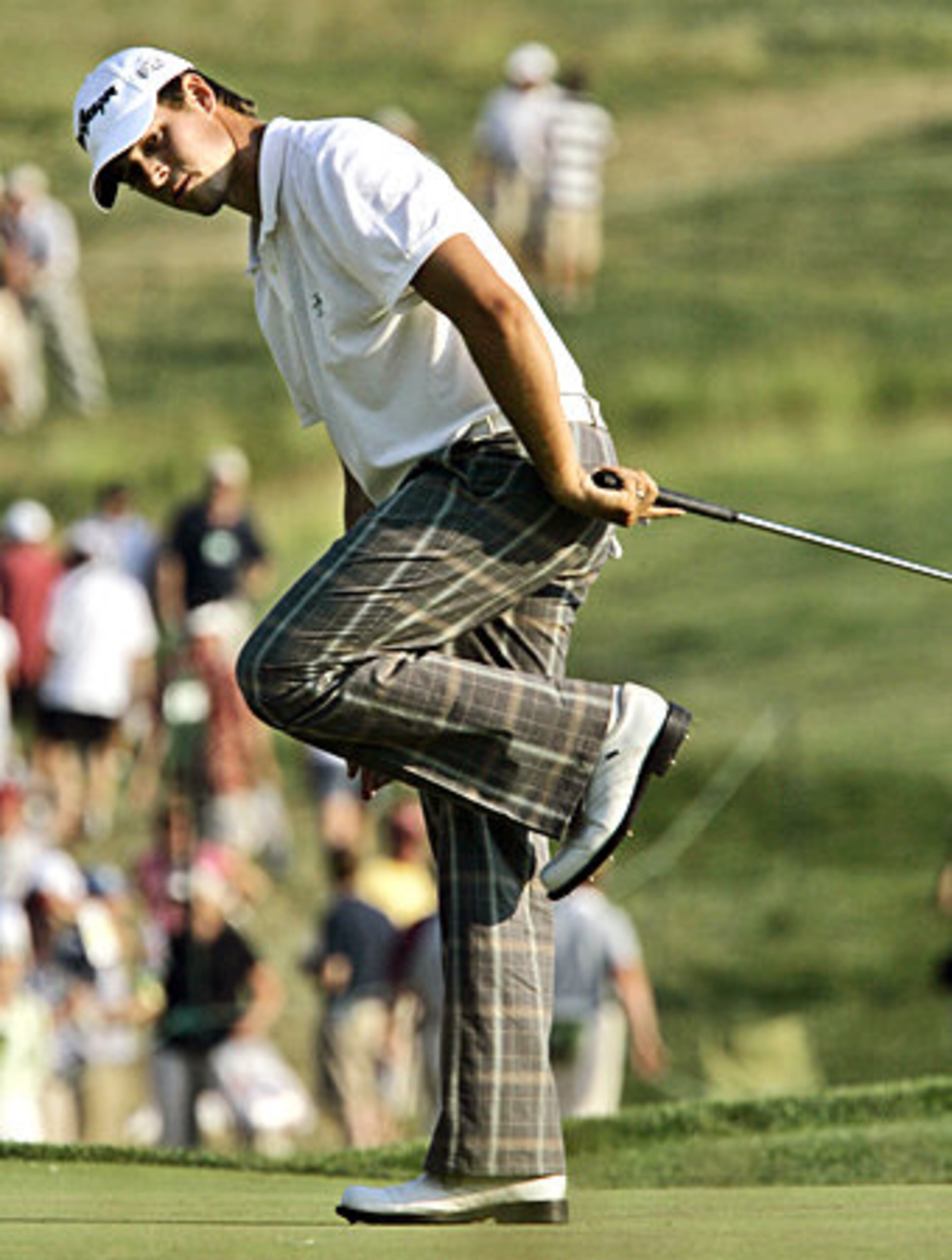 Aaron Baddeley of Australia knows how to strike a pose. His stylist may need to be fired, however.