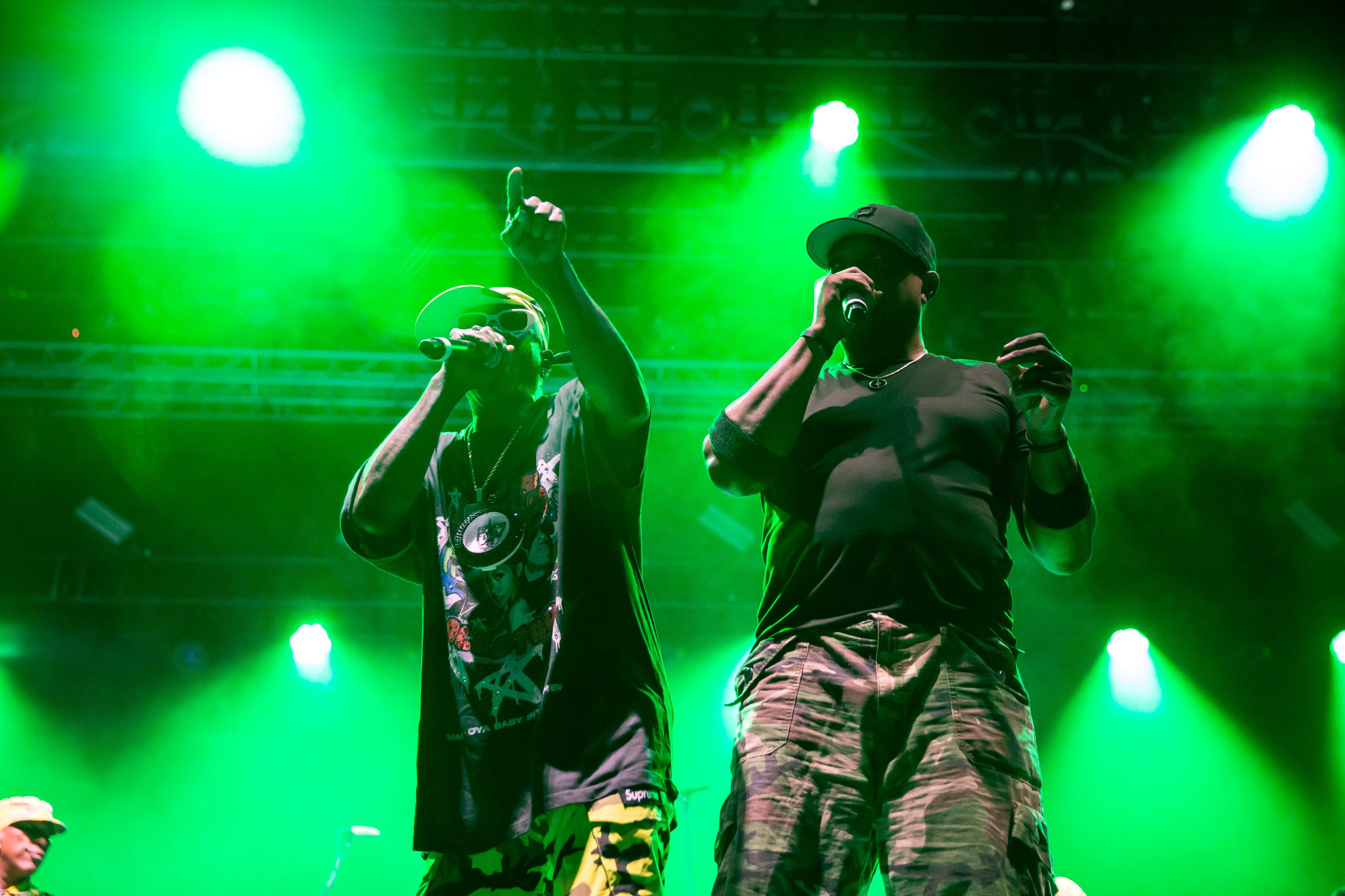 Public Enemy's Flava Flav (left) and Chuck D perform during a late-night set at the Shaky Knees Music Festival at Piedmont Park on Saturday, Sept. 20, 2025, in Atlanta. (Ryan Fleisher for the AJC)