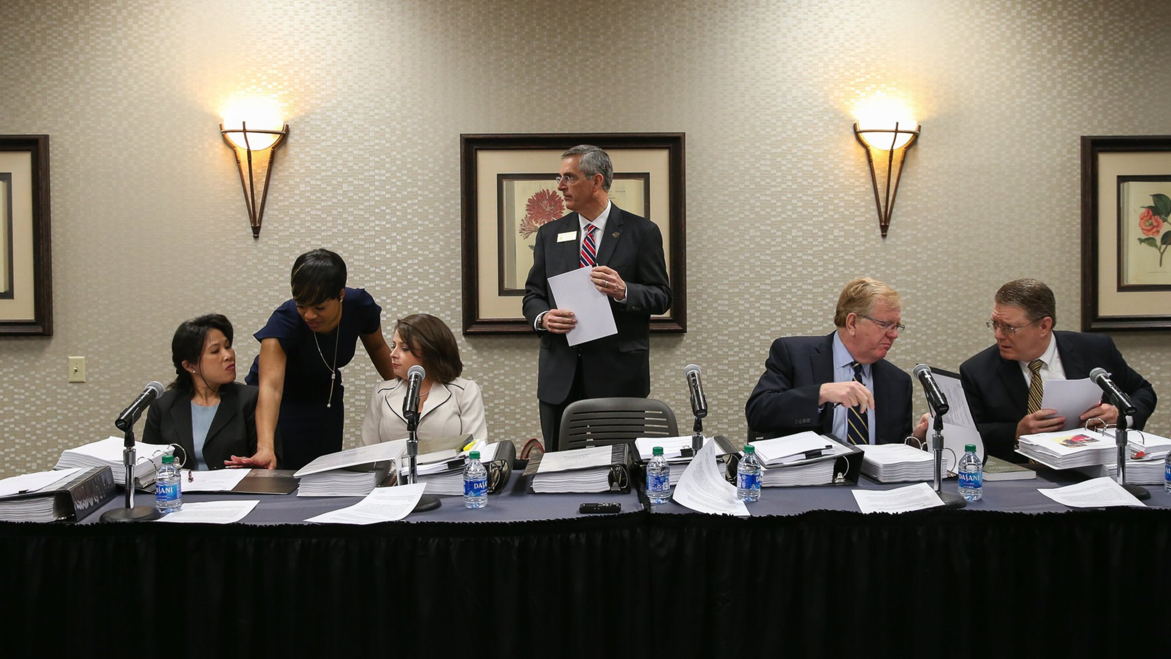 State Election Board members prepare for an emergency hearing in March at the Georgia Center for Continuing Education in Athens. (Photo/Austin Steele for The Atlanta Journal Constitution)