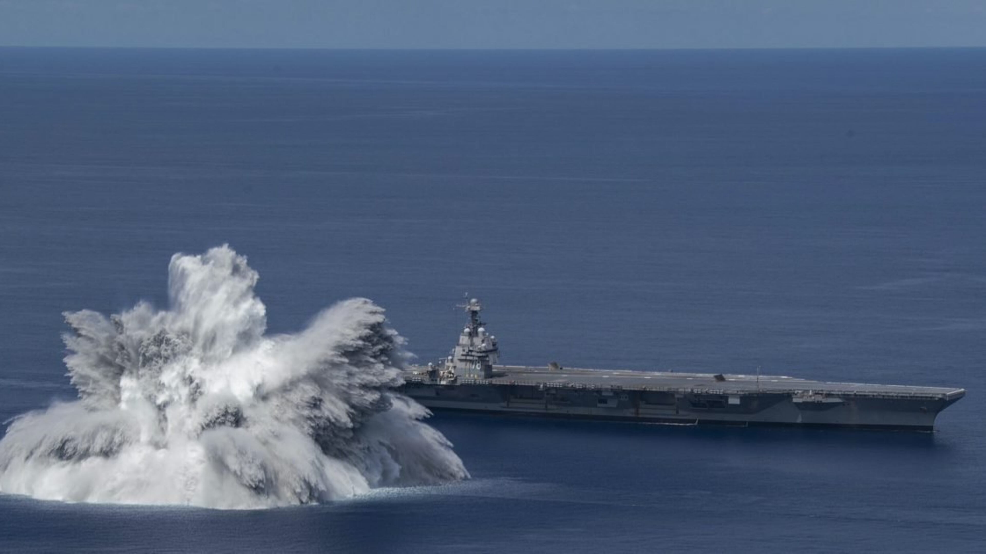 The Navy blasted its newest carrier with thousands of pounds of explosives in the Atlantic Ocean on Friday to simulate how the ship would perform in battle conditions, according to images released by the service and government earthquake monitors. (Image: U.S. Navy)