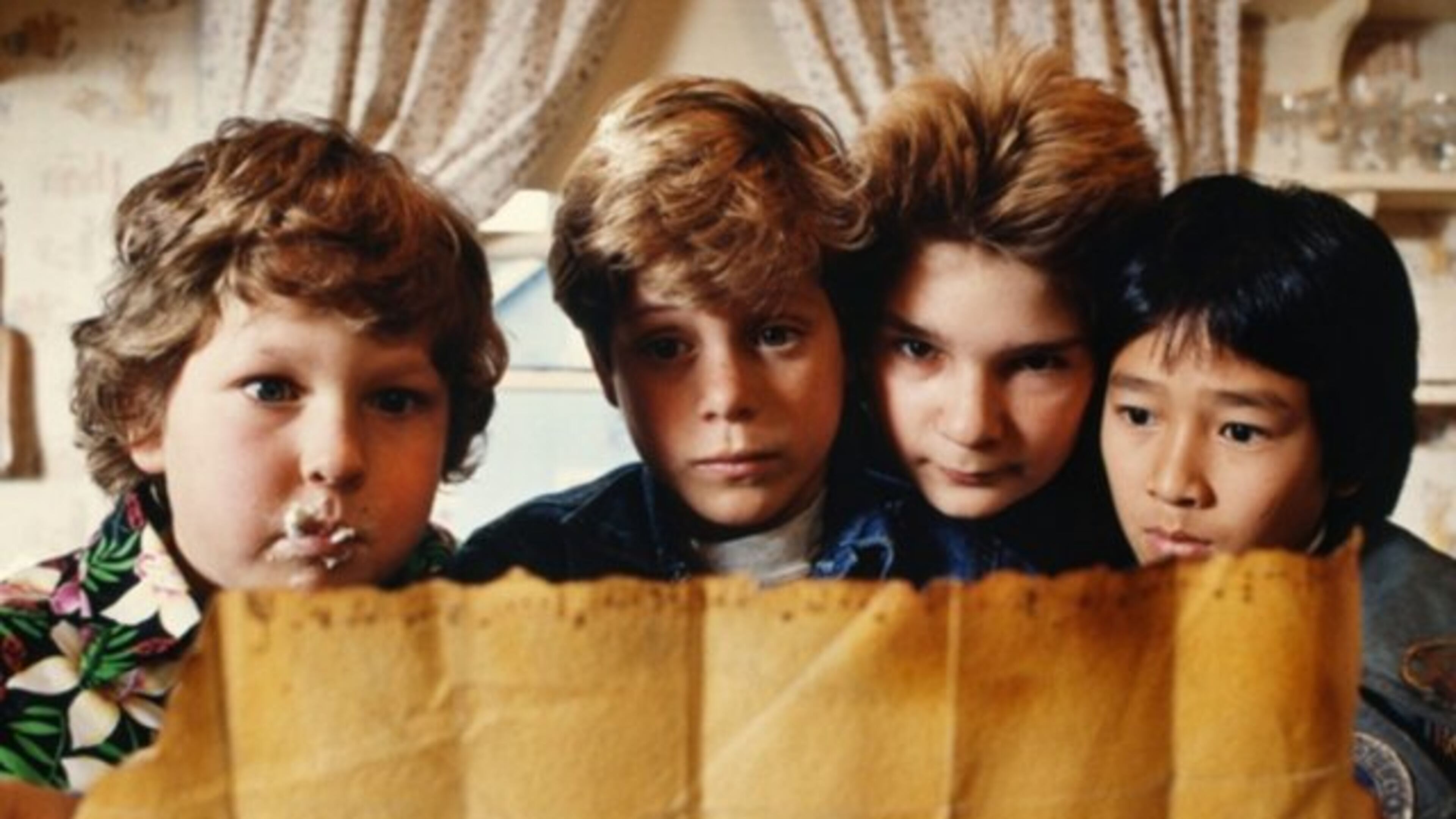 "The Goonies": Chunk and Sloth bonded over a Baby Ruth candy bar.