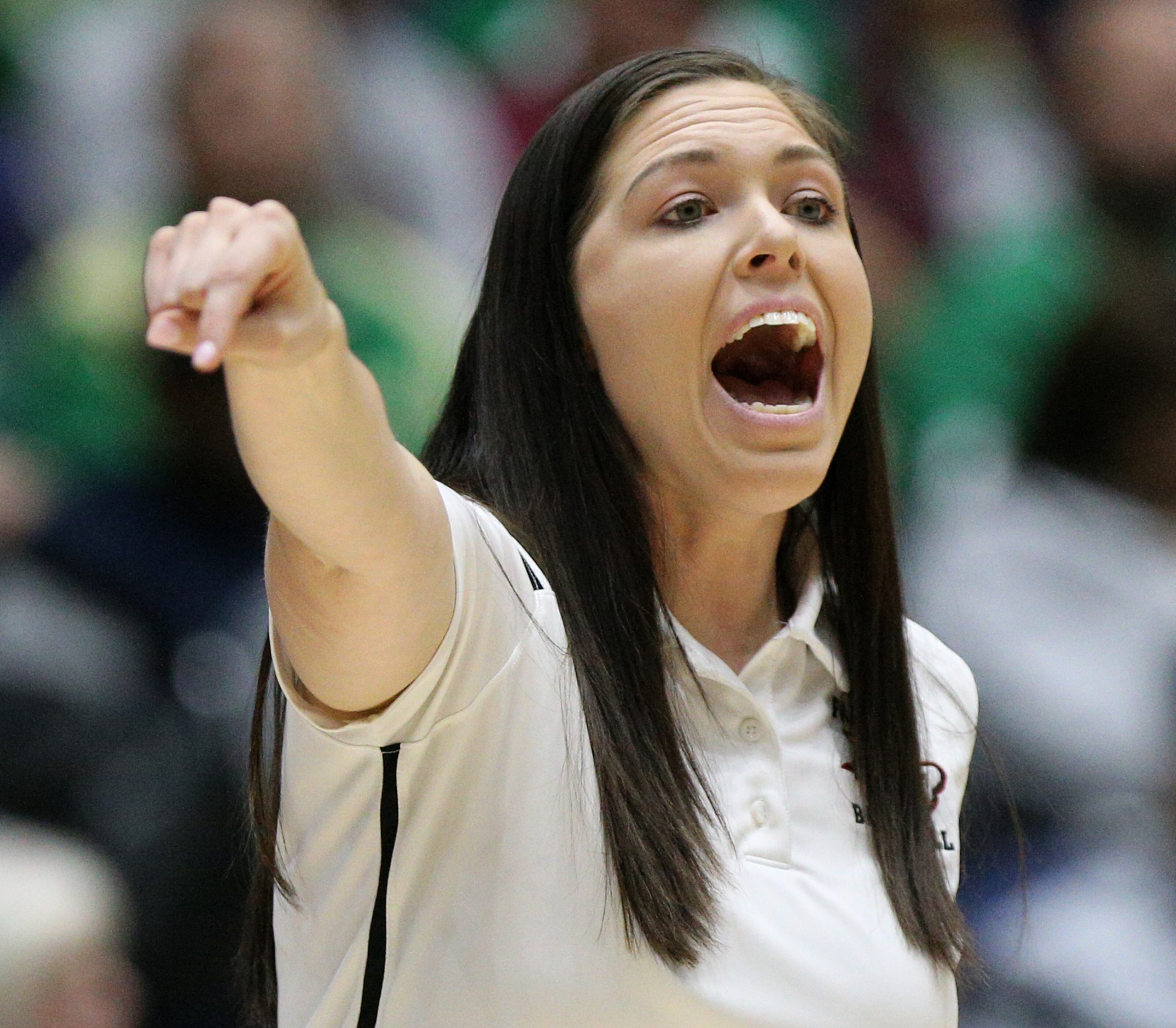 March 8, 2018 Macon: Flowery Branch head coach Courtney Newton calls a defensive set against Buford in their GHSA state basketball championship game on Thursday, March 8, 2018, in Macon. Curtis Compton/ccompton@ajc.com