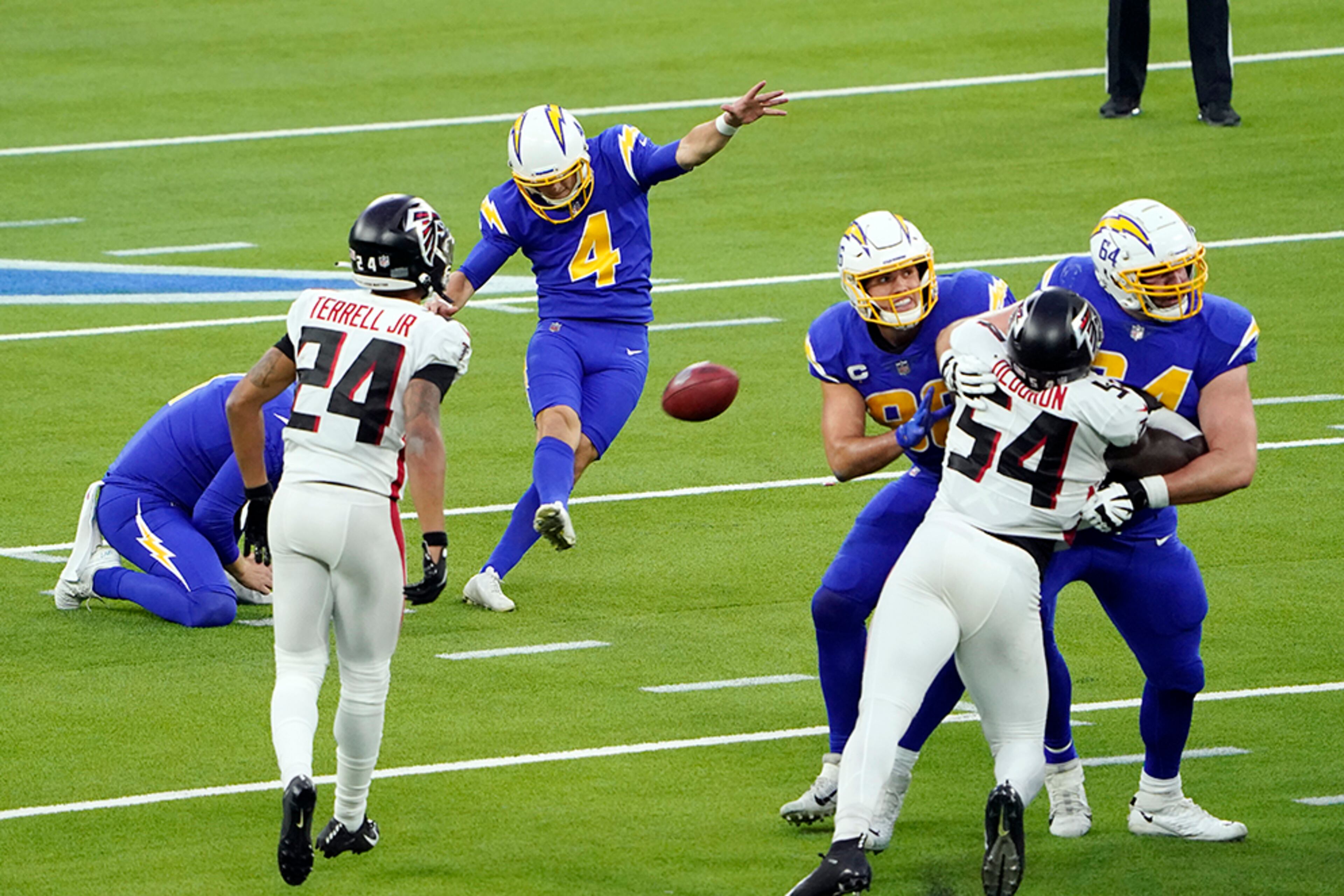Los Angeles Chargers kicker Mike Badgley (4) kicks a game-winning field goal during the final seconds against the Atlanta Falcons Sunday, Dec. 13, 2020, in Inglewood, Calif. The Chargers won 20-17. (Jae C. Hong/AP)