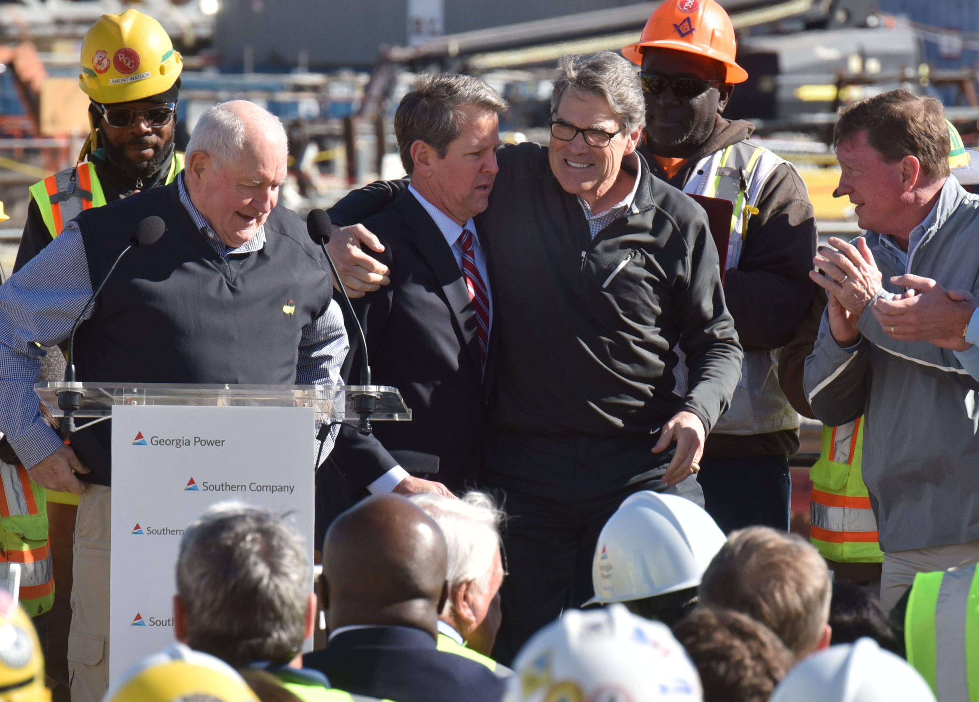 Officials spoke during a press event at the expansion site for Plant Vogtle. Among those in attendance were then-U.S. Agriculture Secretary Sonny Perdue, Georgia Gov. Brian Kemp, then-U.S. Energy Secretary Rick Perry and then-Southern Company CEO Thomas Fanning. The Energy Department approved up to $3.7 billion in additional loan guarantees for the nuclear project. (Hyosub Shin/AJC)