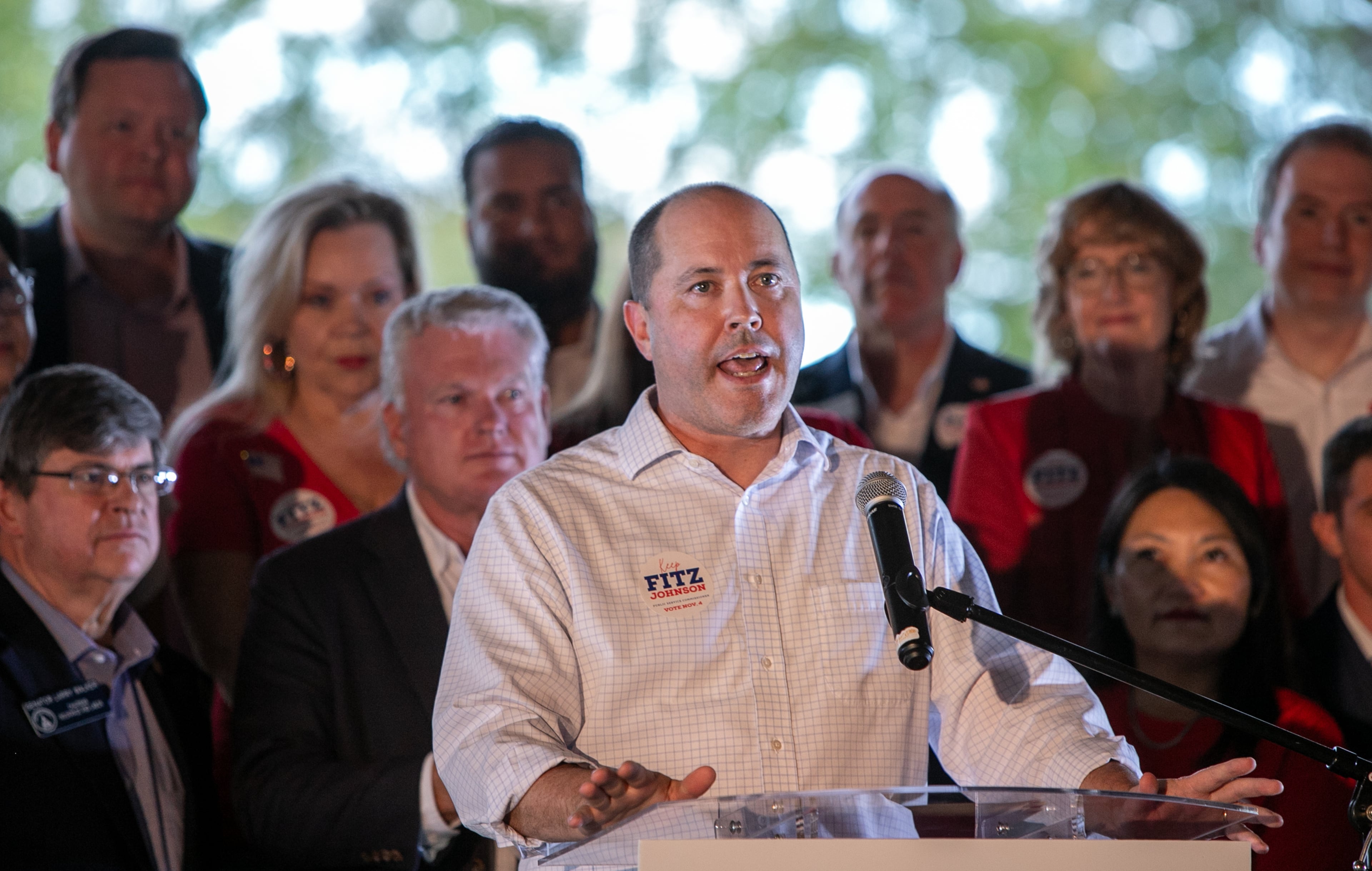 Attorney General Chris Carr (at microphone) is a Republican candidate for governor. (Jenni Girtman for the AJC)
