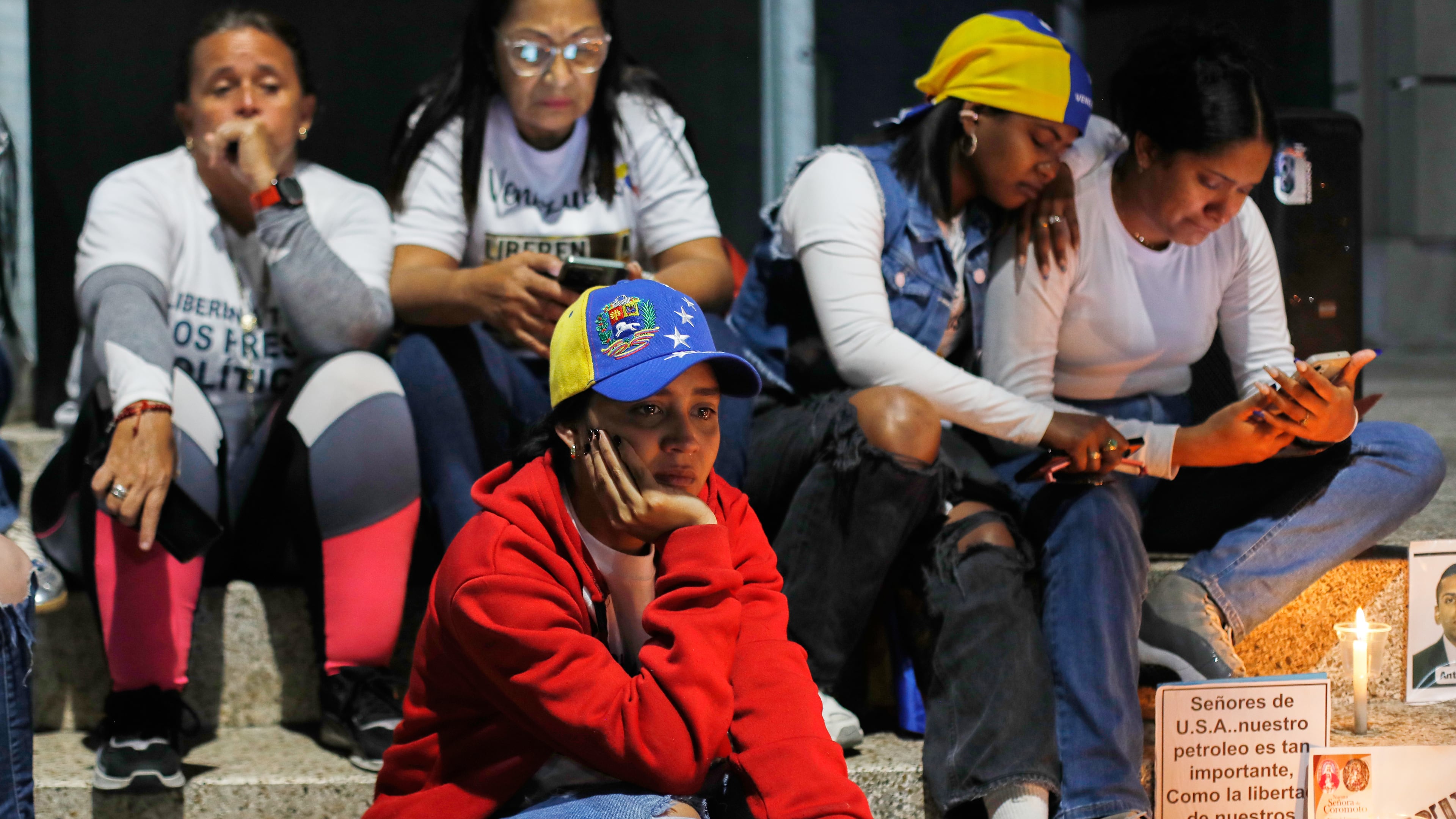 Relatives of detainees they say are held for political reasons wait outside El Helicoide, the headquarters of Venezuela's intelligence service and a detention center, after the National Assembly approved an amnesty bill in Caracas, Venezuela, Thursday, Feb. 19, 2026. (AP Photo/Crisitian Hernandez)