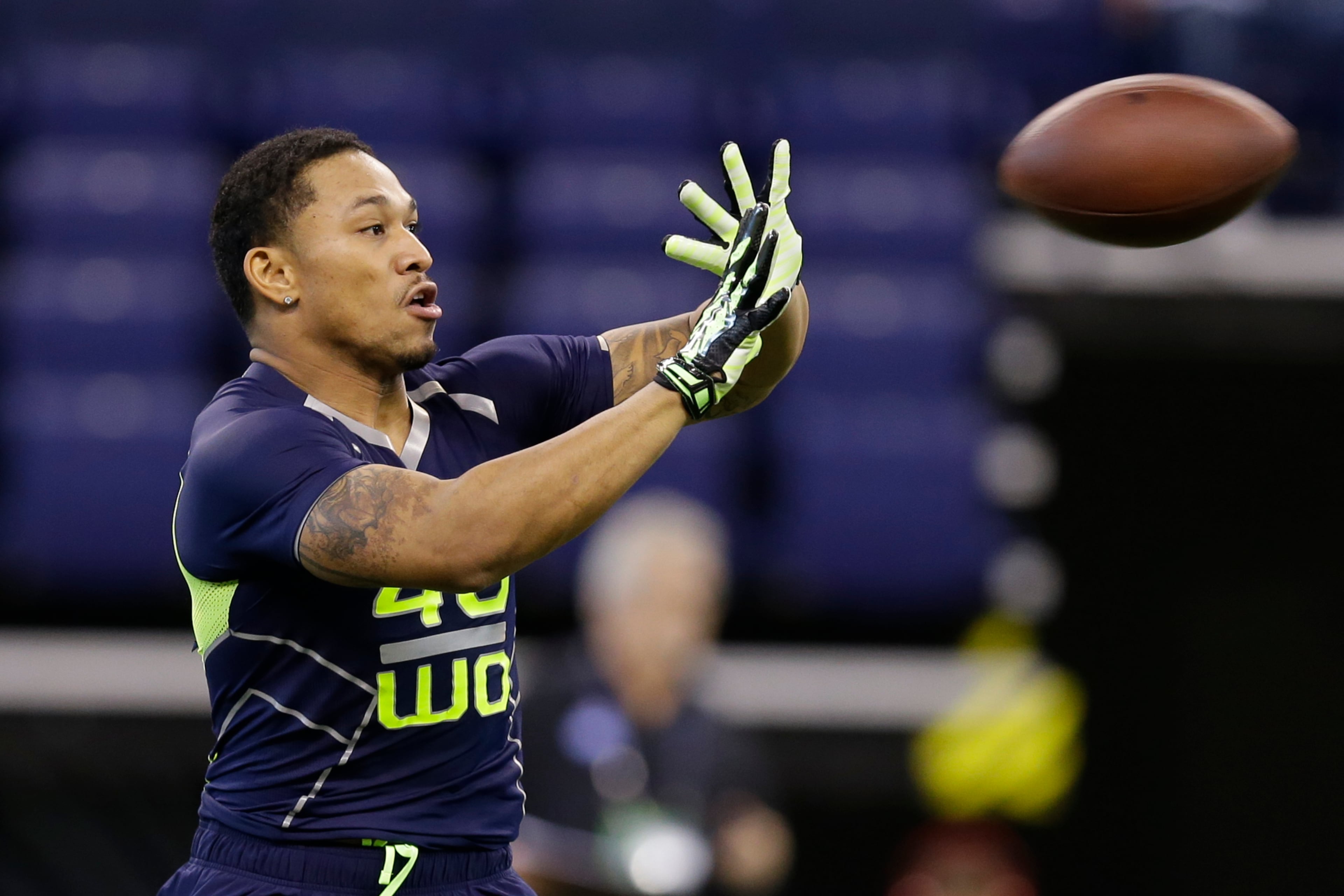 Georgia State wide receiver Albert Wilson makes a catch during a drill at the NFL football scouting combine in Indianapolis, Sunday, Feb. 23, 2014. (AP Photo/Michael Conroy)