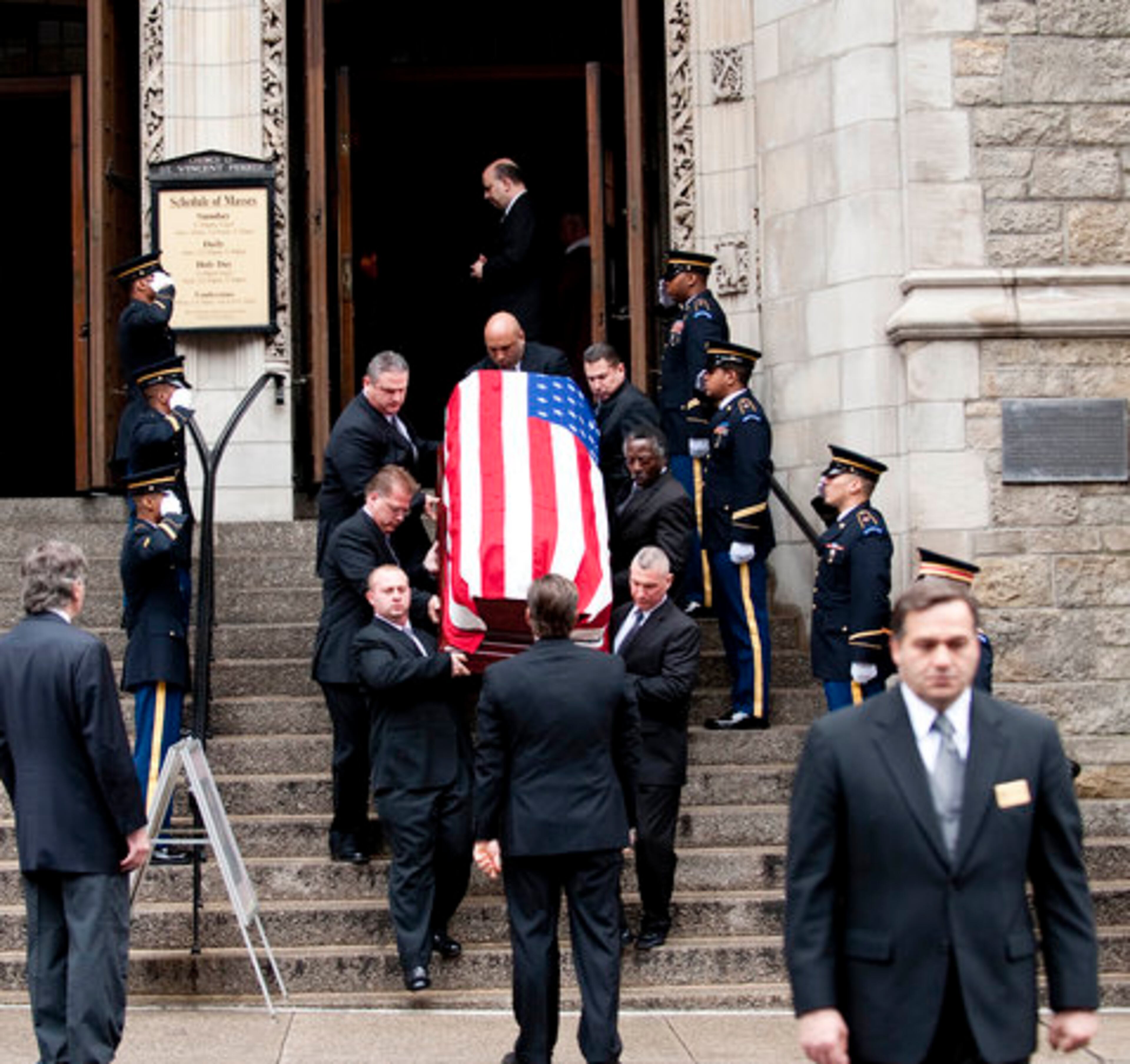 The flag-draped casket of former vice presidential candidate Geraldine Ferraro is carried out of the Church of Saint Vincent Ferrer, Thursday, March 31, 2011, in New York. Ferraro died Saturday of multiple myeloma, a form of blood cancer. She was 75.