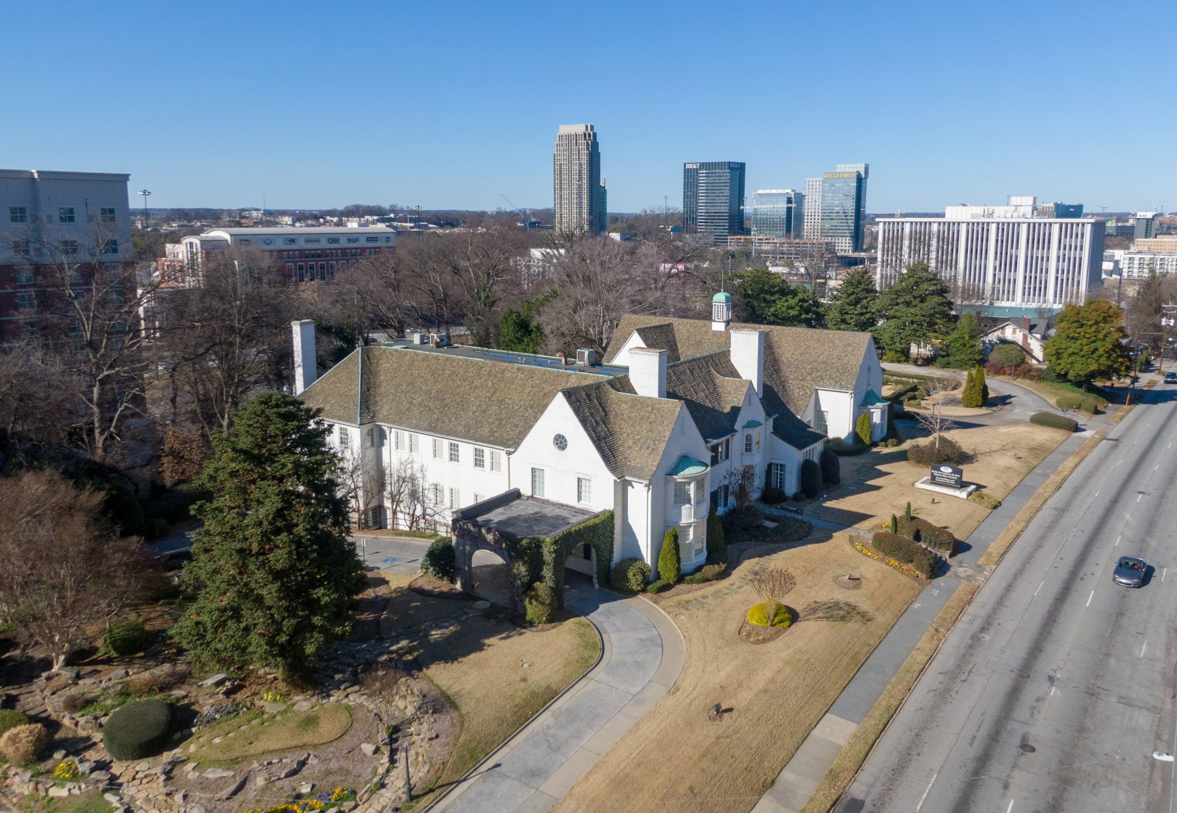 January 7, 2020 Atlanta - Aerial photo of H.M. Patterson & Son-Spring Hill Chapel at 1020 Spring Street NW on Tuesday, January 7, 2020. A 91-year-old Midtown mortuary will be converted into an entertainment and food space as part of an Atlanta developer’s plans to build a mixed-used property that includes residential, office and hotel space. H.M. Patterson & Sons-Spring Hill Mortuary will close its doors Friday, an employee with the mortuary said. The property was designated a historic landmark in 2018. Atlanta-based developer Portman Holdings purchased the property in December but said it plans to change the exterior of the building. (Hyosub Shin / Hyosub.Shin@ajc.com)