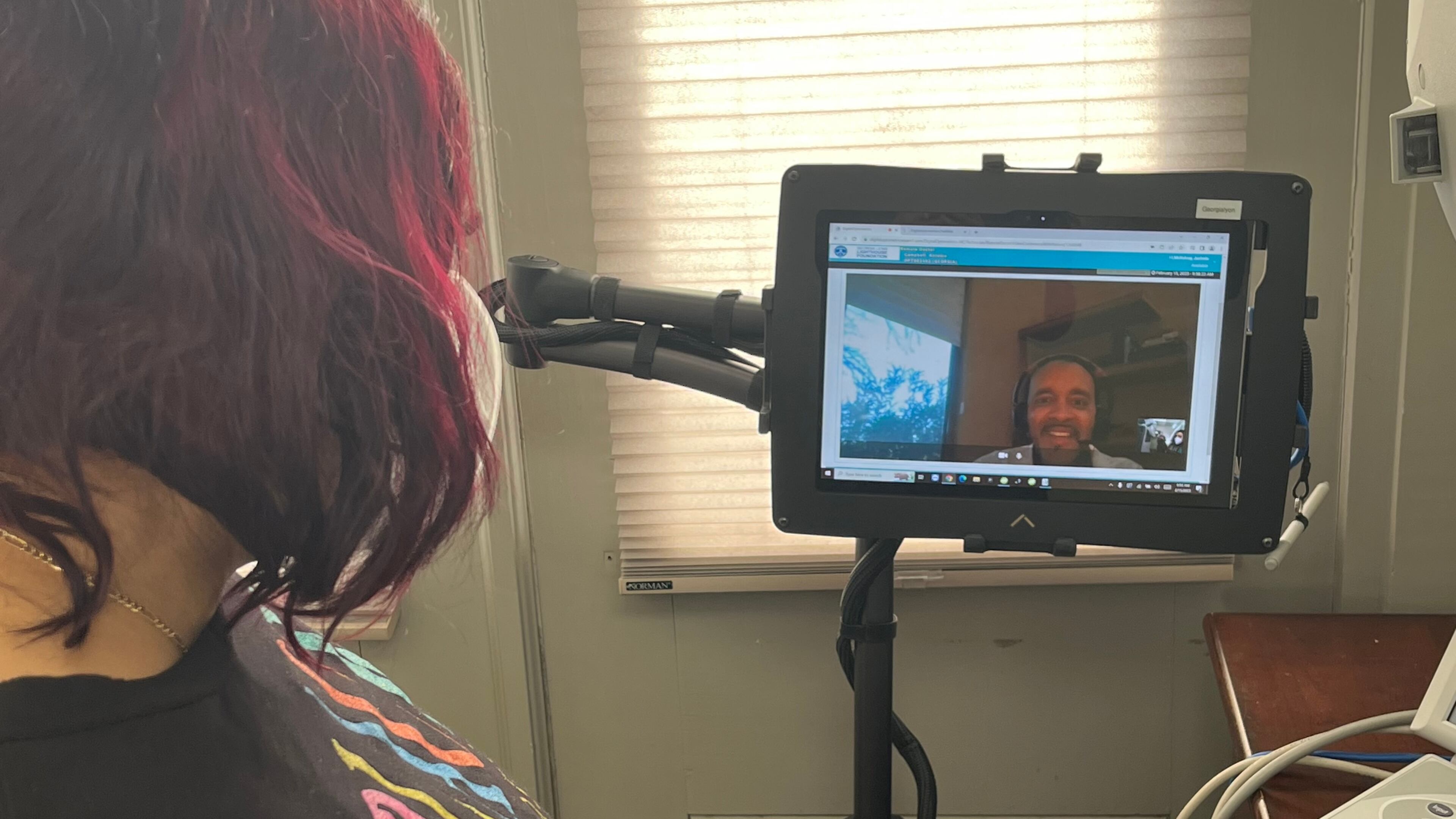 Dr. Antonio Campbell (onscreen) works with a patient in Macon to access vision needs. The Chamblee-based Lions Lighthouse Foundation provides services to parts of the state where they are unavailable.