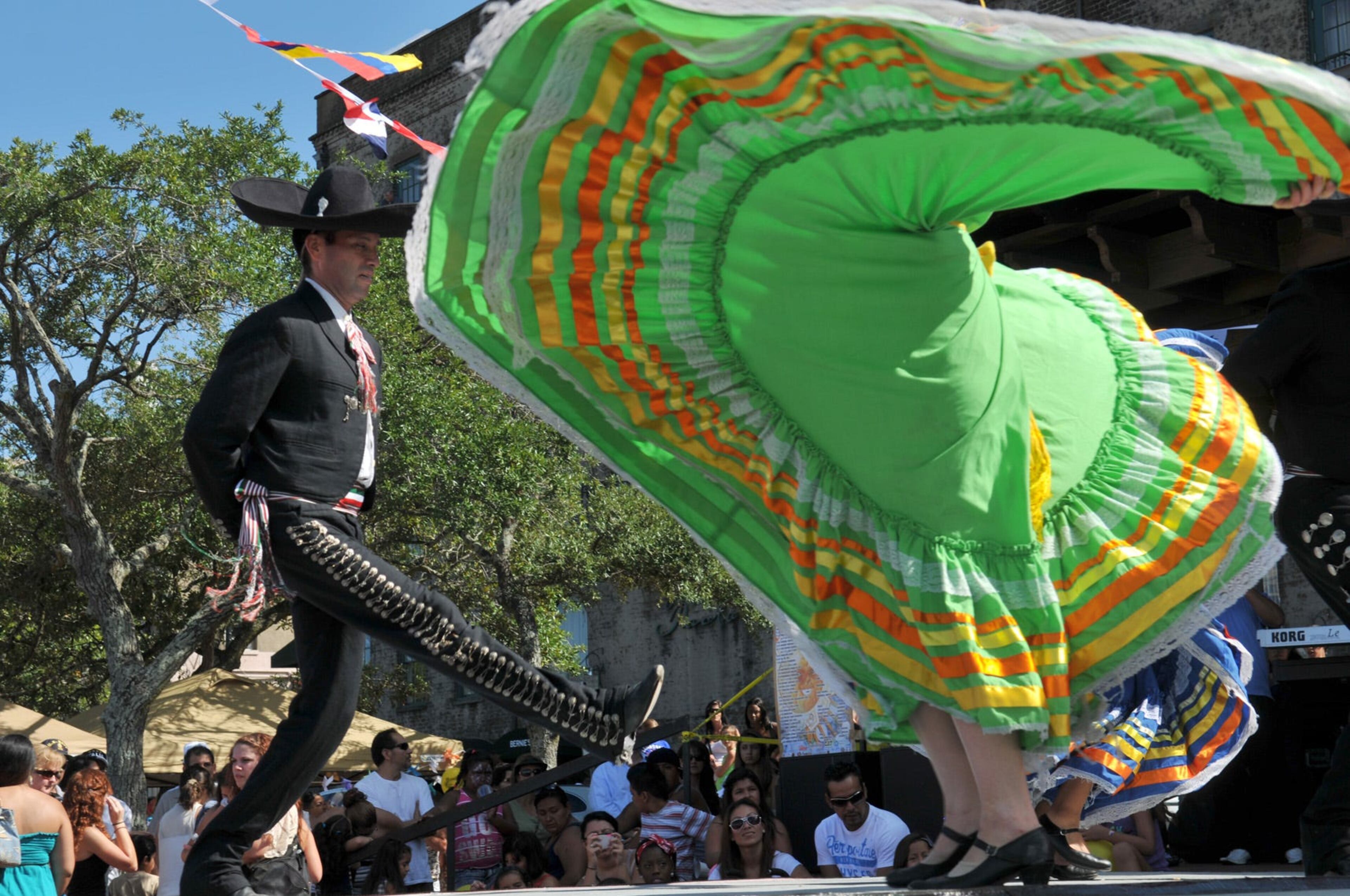 Tradicion Latina performs a Mexican dance during the Fiesta Latina on Saturday, September 15, 2012 at Rousakis Plaza on River Street.
