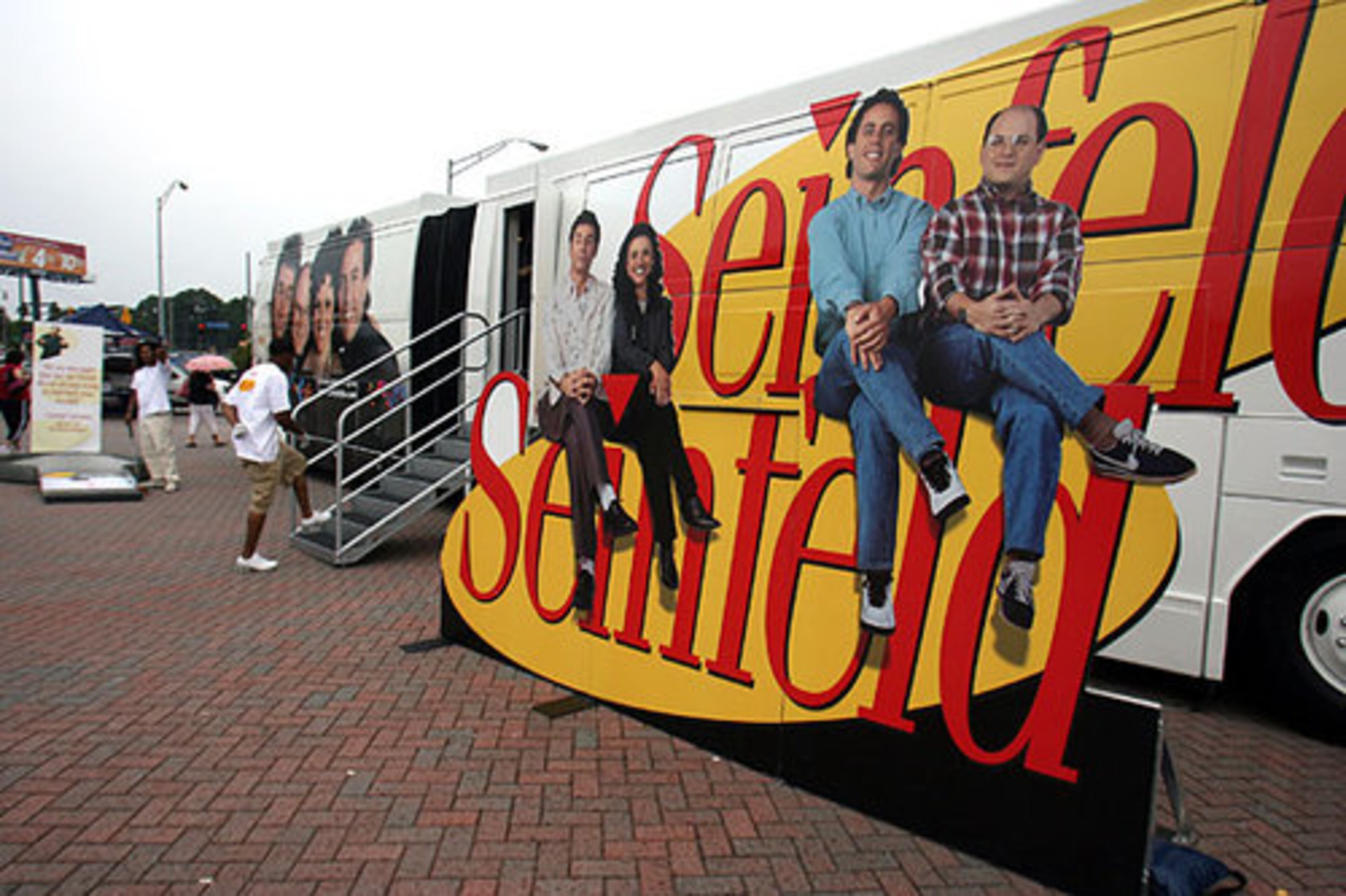 The"Seinfeld" bus filled with memoribilia and games made a stop Monday outside Turner Field. The bus' next stop in Atlanta is outside Criminal Records in Little Five Points on Tuesday.