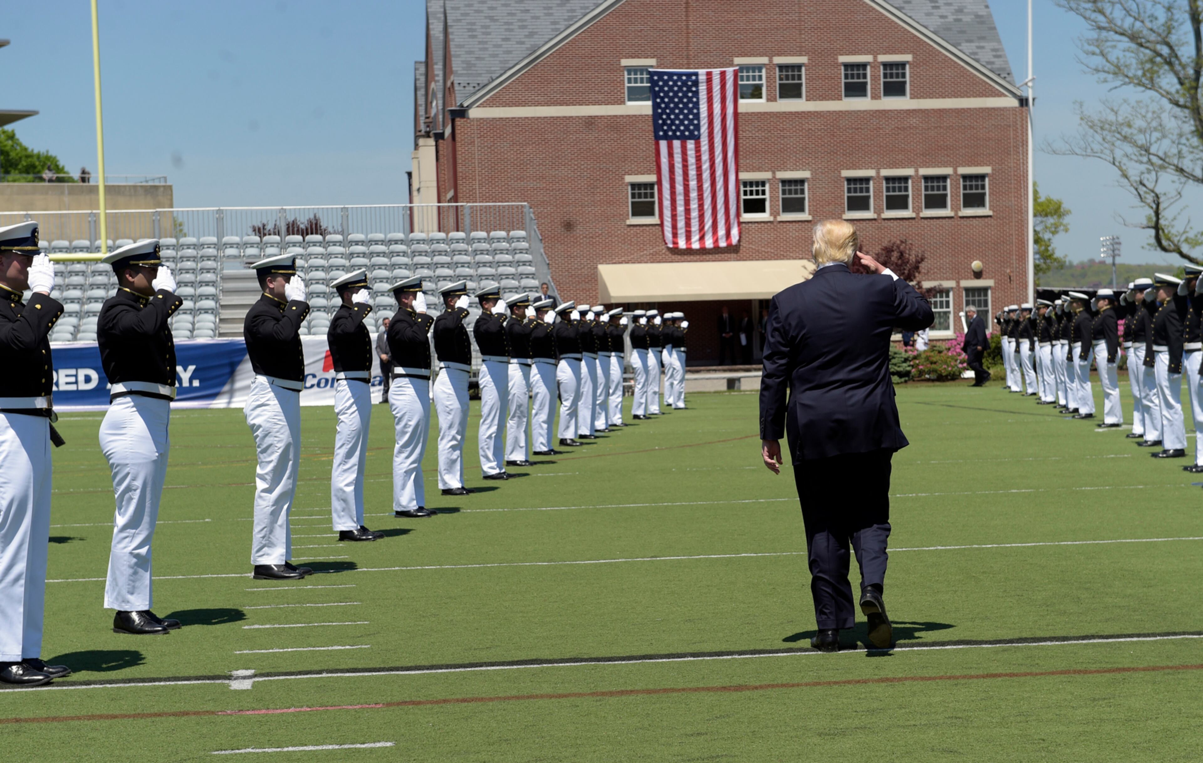 President Donald Trump salutes as he leaves commencement exercises at the U.S. Coast Guard Academy in New London, Conn., Wednesday, May 17, 2017, where he gave the commencement address. (AP Photo/Susan Walsh)
